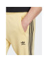 adidas Pantaloni trening Adicolor Classics 3-Stripes Joggers IA4793 Galben Fitted Fit - Pled.ro