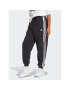 adidas Pantaloni trening Essentials 3-Stripes French Terry Loose-Fit Joggers HA4375 Negru Loose Fit - Pled.ro