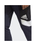 adidas Pantaloni trening Essentials Colorblock HY8684 Bleumarin Regular Fit - Pled.ro