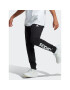 adidas Pantaloni trening Essentials French Terry Tapered Cuff Logo Joggers IC0063 Negru Regular Fit - Pled.ro