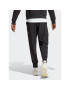 adidas Pantaloni trening Essentials Small Logo Woven Cargo Ankle-Length Pants HA4348 Negru Regular Fit - Pled.ro