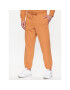 New Balance Pantaloni trening MP23551 Portocaliu Relaxed Fit - Pled.ro