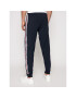 Tommy Hilfiger Pantaloni trening Repeat Logo UM0UM01918 Bleumarin Regular Fit - Pled.ro