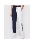 Tommy Jeans Pantaloni trening Archive 1 DW0DW14425 Bleumarin Relaxed Fit - Pled.ro