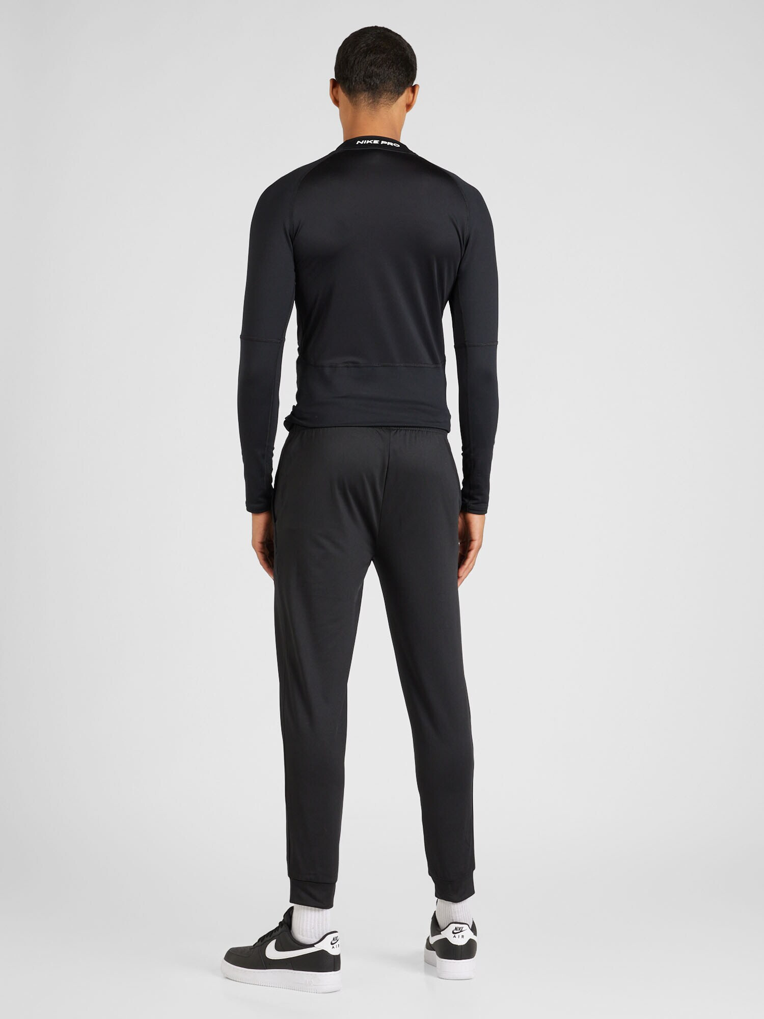 4F Pantaloni sport gri închis / negru - Pled.ro