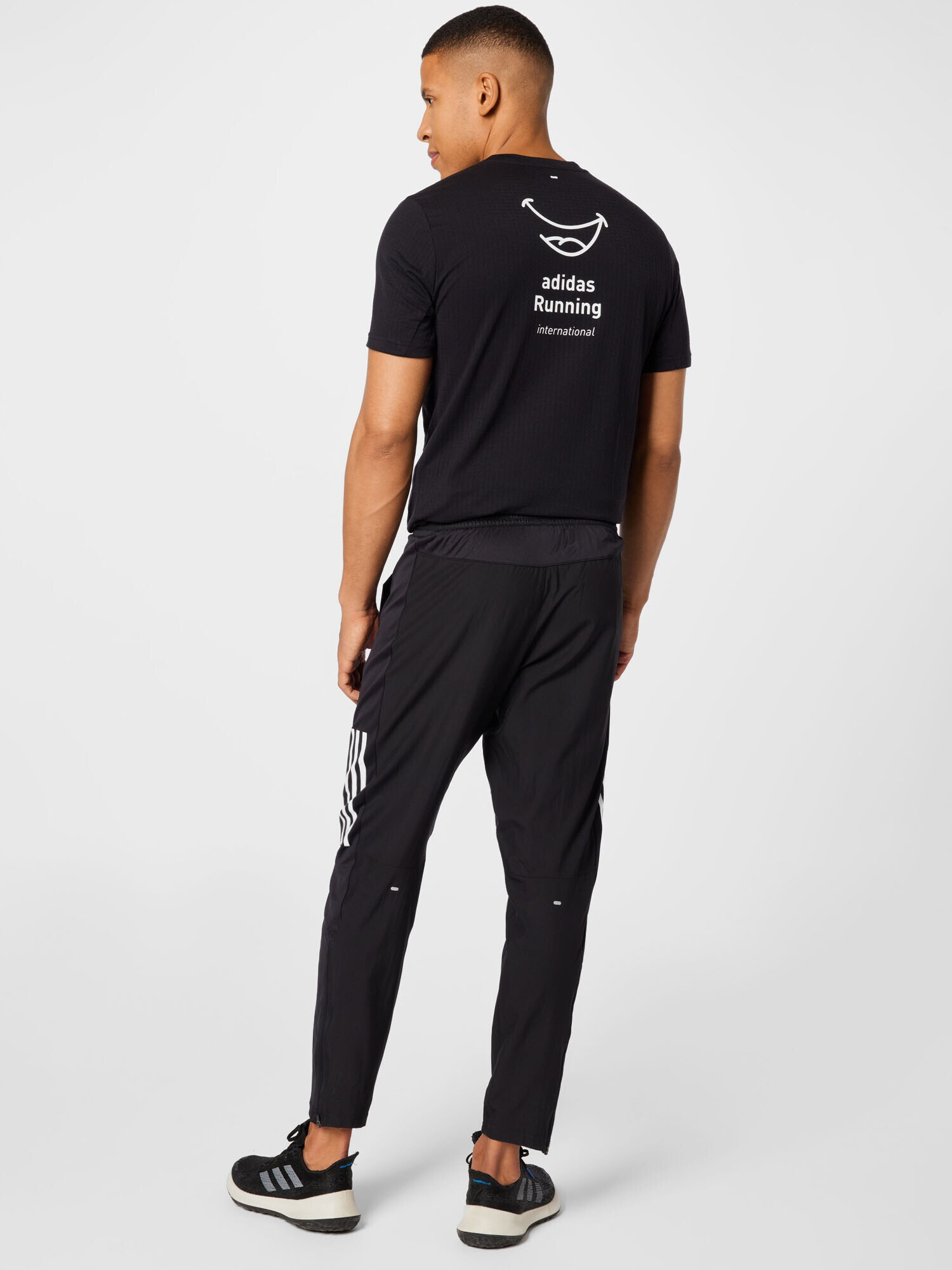 ADIDAS SPORTSWEAR Pantaloni sport 'Own The Run Astro Wind' negru / alb - Pled.ro