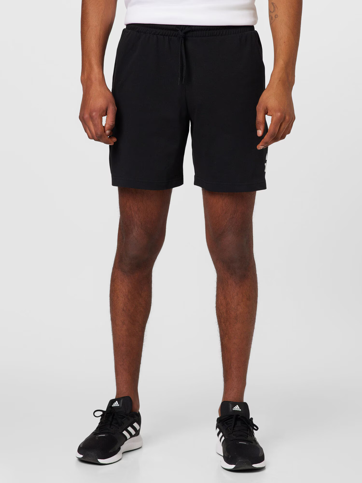 ADIDAS SPORTSWEAR Pantaloni sport 'Essentials Logo' negru / alb - Pled.ro