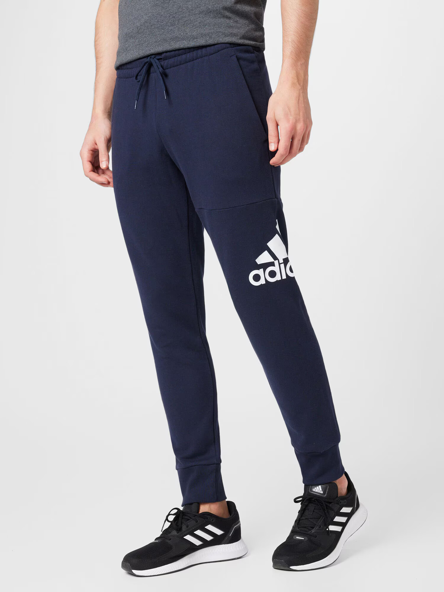 ADIDAS SPORTSWEAR Pantaloni sport 'Essentials French Terry Tapered Cuff Logo' albastru închis / alb - Pled.ro