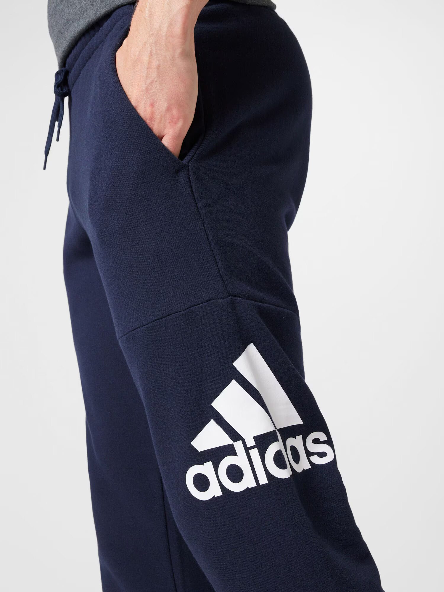 ADIDAS SPORTSWEAR Pantaloni sport 'Essentials French Terry Tapered Cuff Logo' albastru închis / alb - Pled.ro