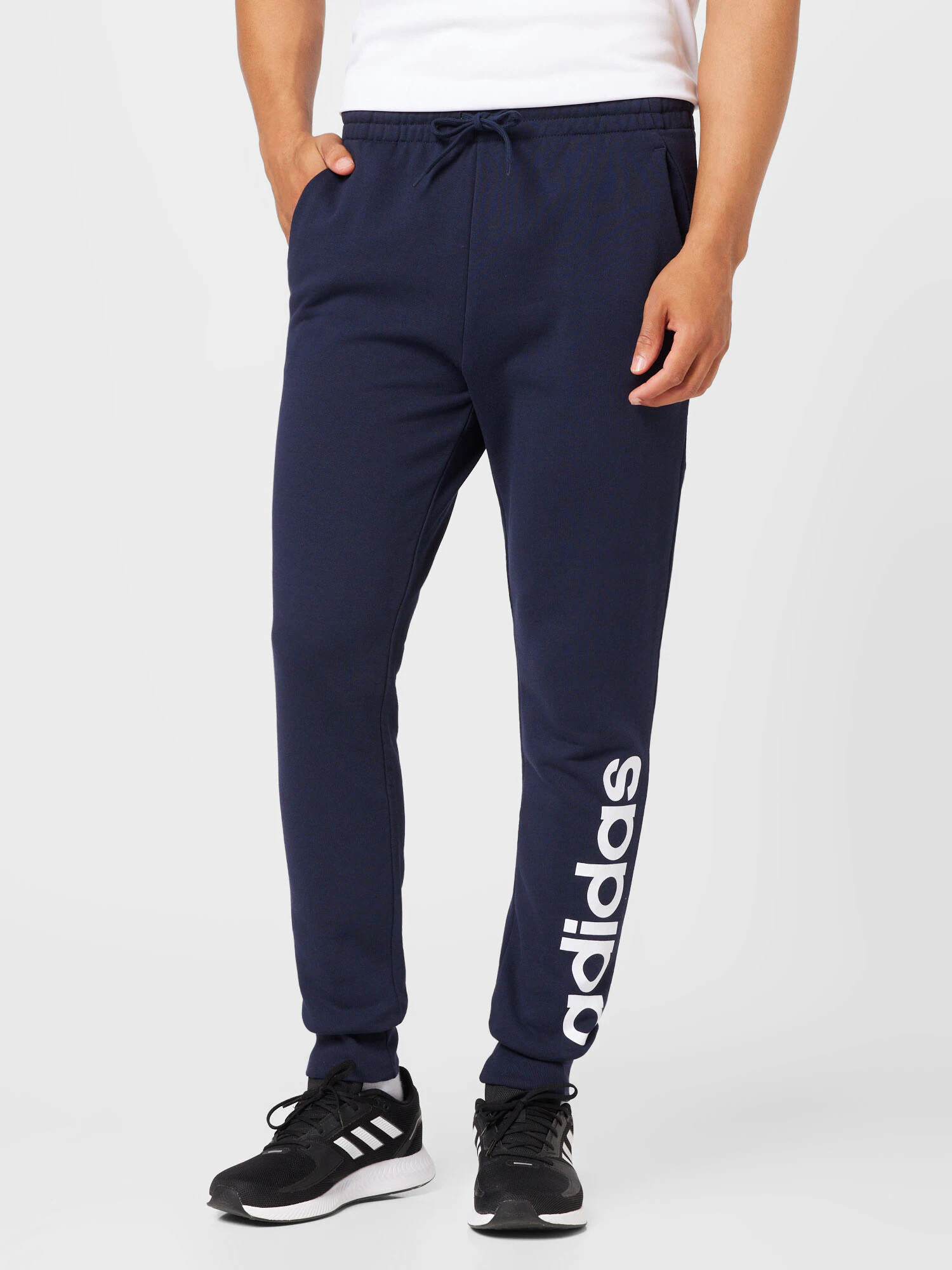 ADIDAS SPORTSWEAR Pantaloni sport 'Essentials French Terry Tapered Cuff Logo' albastru marin / alb - Pled.ro