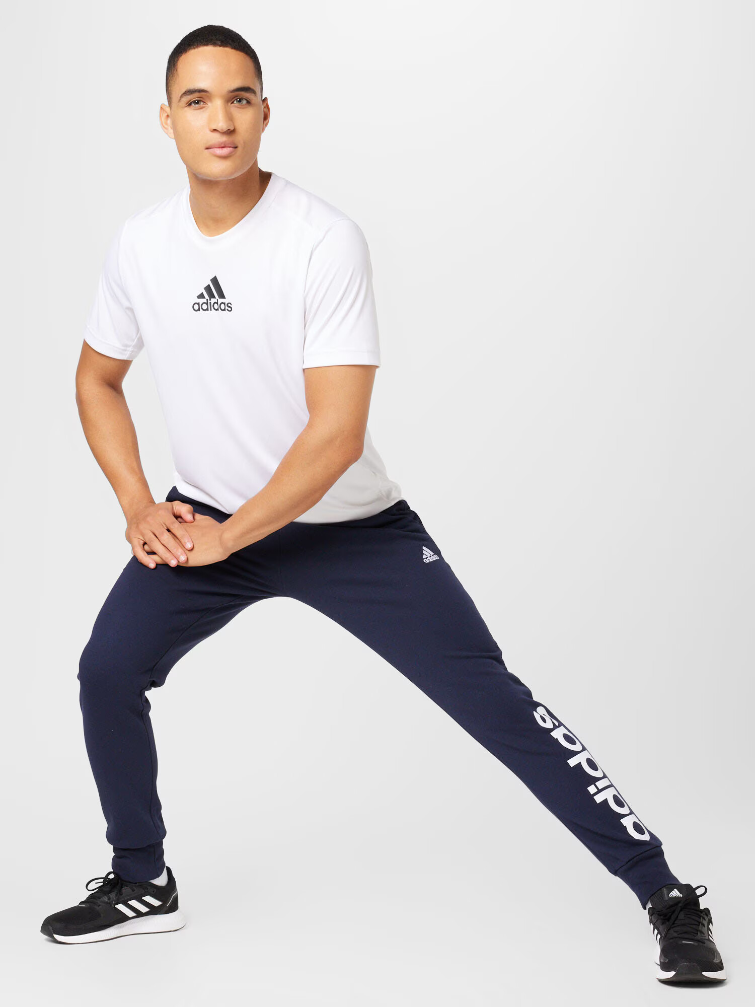 ADIDAS SPORTSWEAR Pantaloni sport 'Essentials French Terry Tapered Cuff Logo' albastru marin / alb - Pled.ro