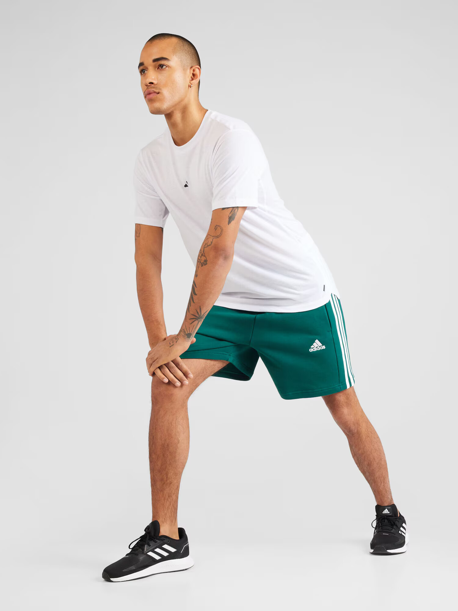 ADIDAS SPORTSWEAR Pantaloni sport 'Essentials' verde / alb - Pled.ro