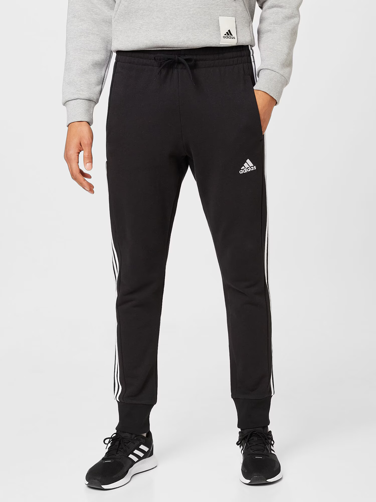 ADIDAS SPORTSWEAR Pantaloni sport 'Essentials French Terry Tapered Cuff 3-Stripes' negru / alb - Pled.ro