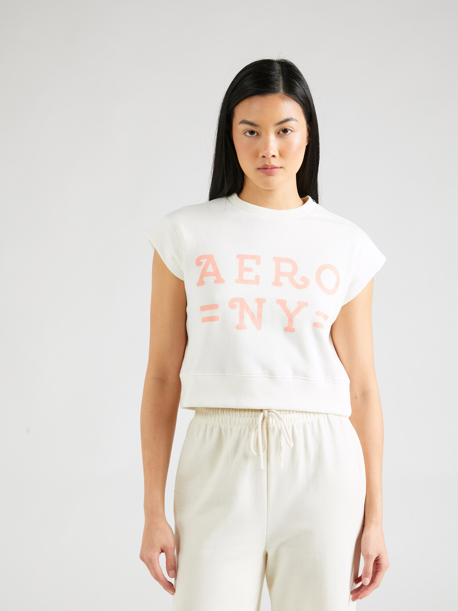 AÉROPOSTALE Tricou 'AERO NY' portocaliu caisă / alb murdar - Pled.ro