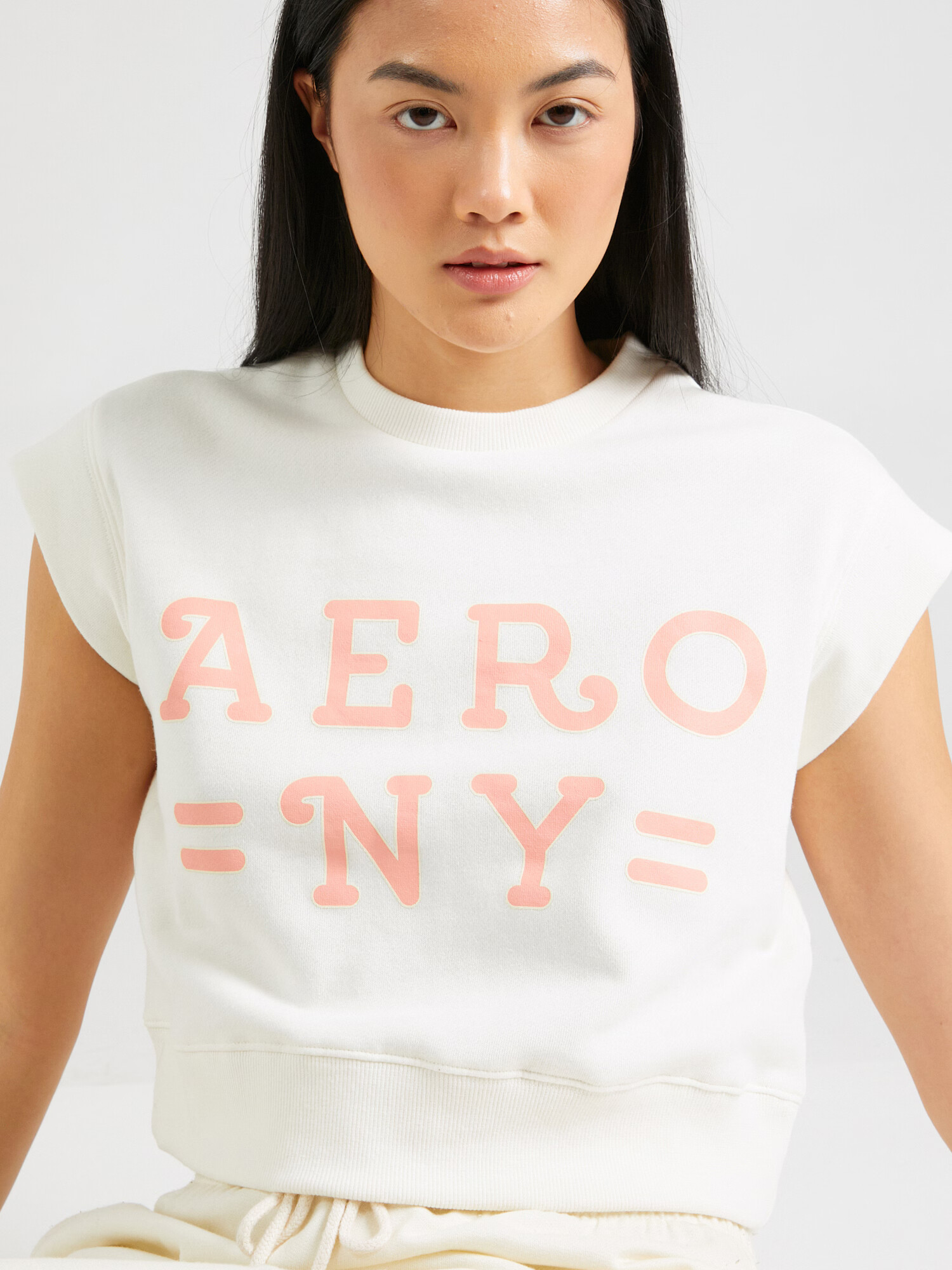 AÉROPOSTALE Tricou 'AERO NY' portocaliu caisă / alb murdar - Pled.ro