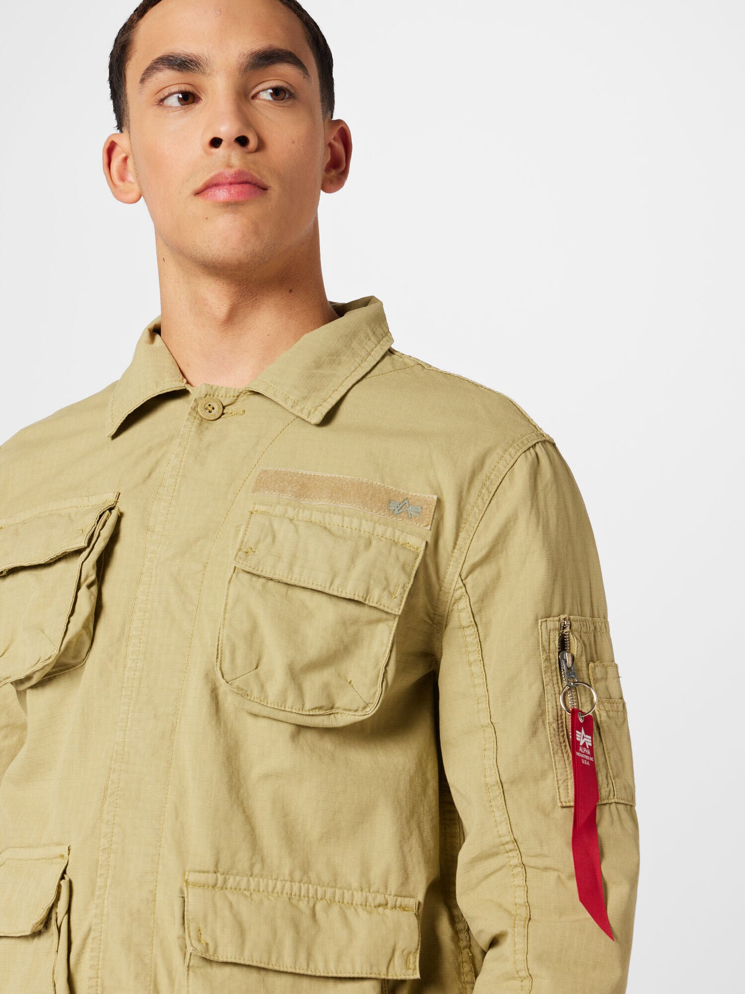 ALPHA INDUSTRIES Geacă de primăvară-toamnă kaki / roșu / alb - Pled.ro