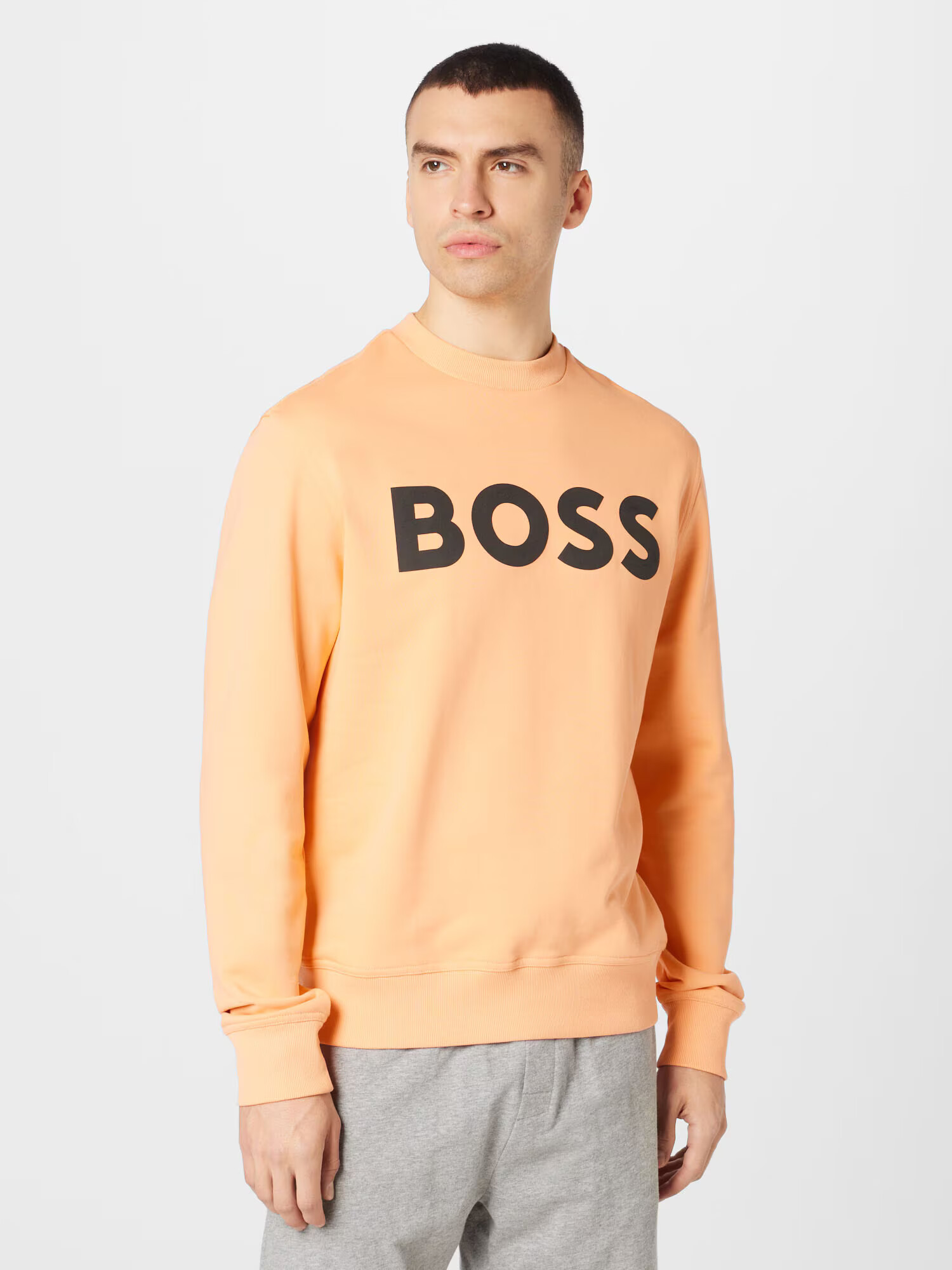 BOSS Orange Bluză de molton portocaliu caisă / negru - Pled.ro