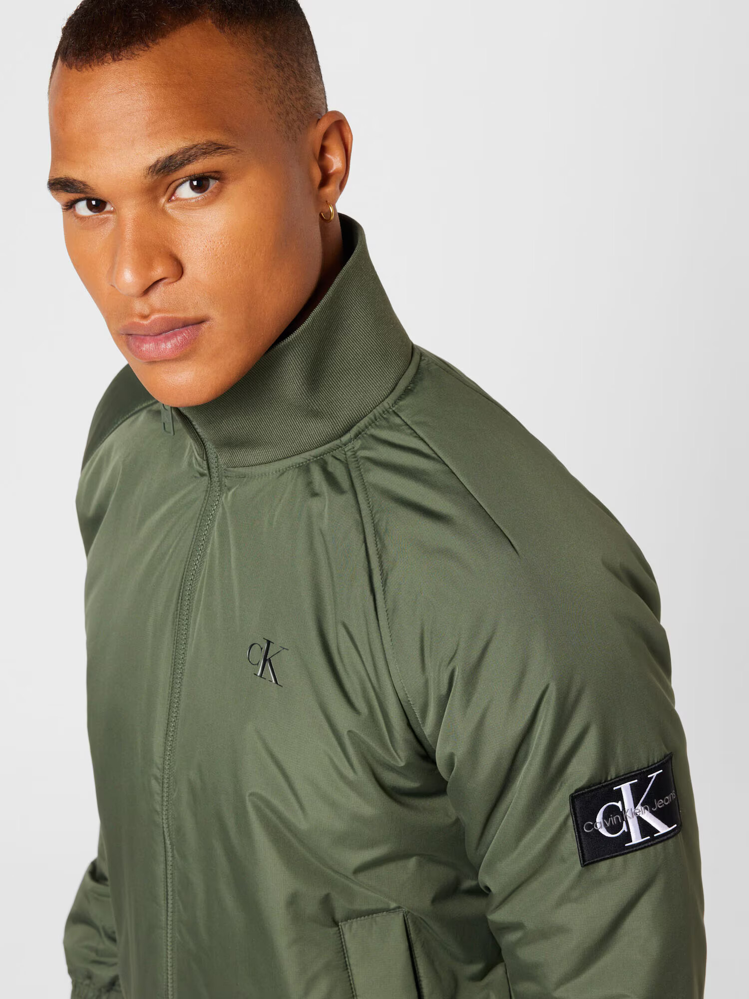 Calvin Klein Jeans Geacă de primăvară-toamnă 'Harrington' oliv / negru / alb - Pled.ro