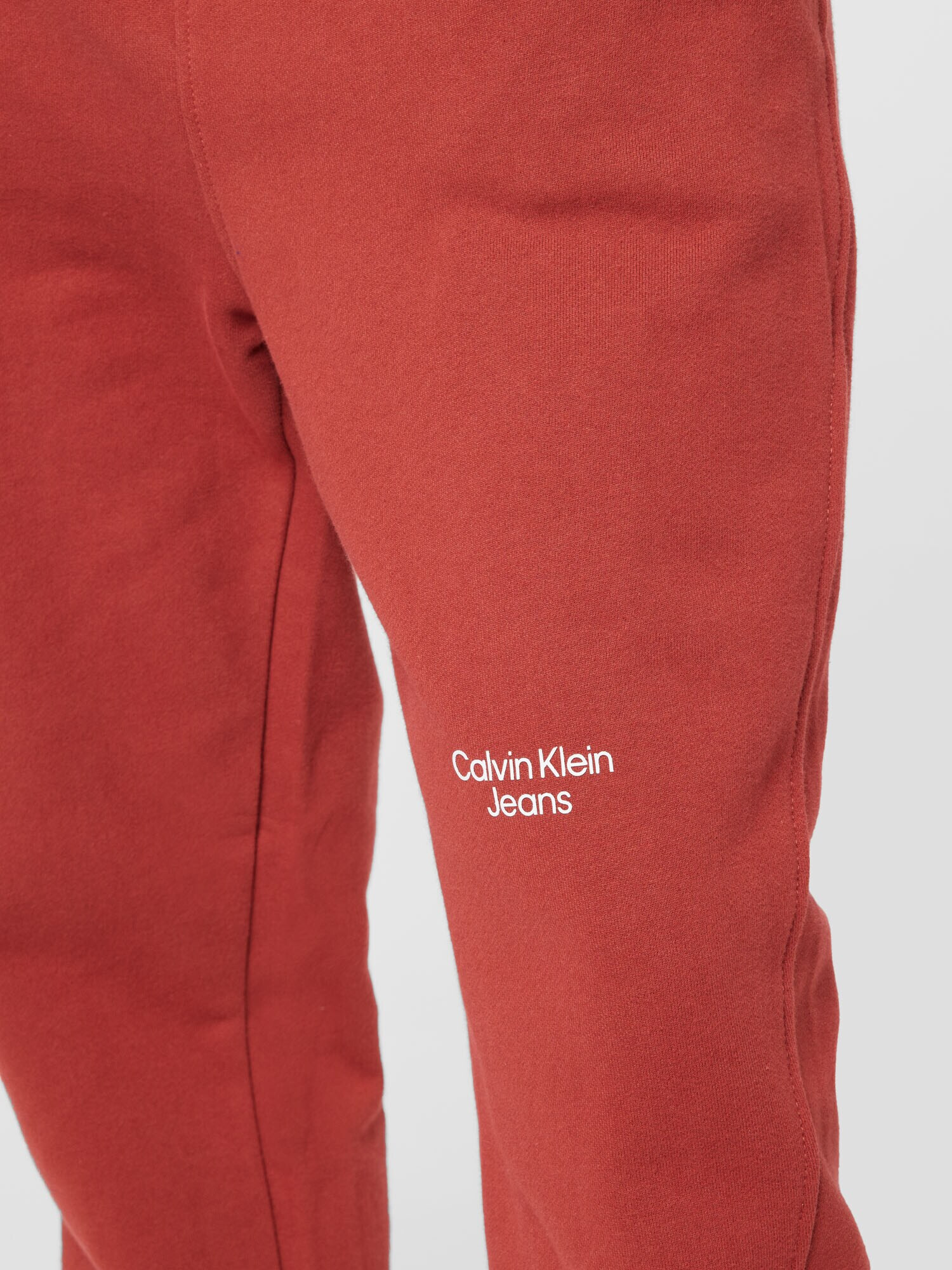 Calvin Klein Jeans Pantaloni maro ruginiu / alb - Pled.ro