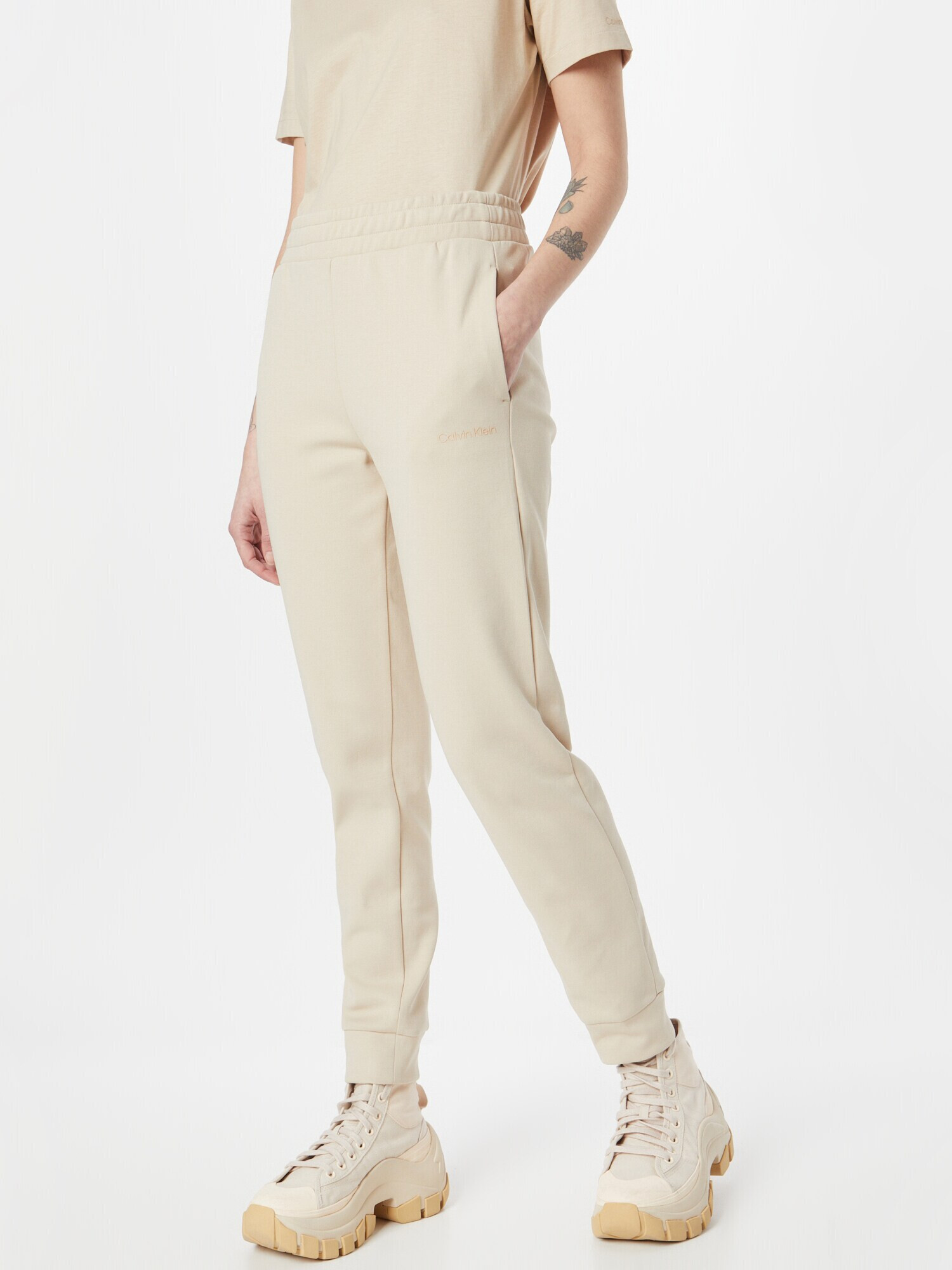 Calvin Klein Pantaloni bej - Pled.ro