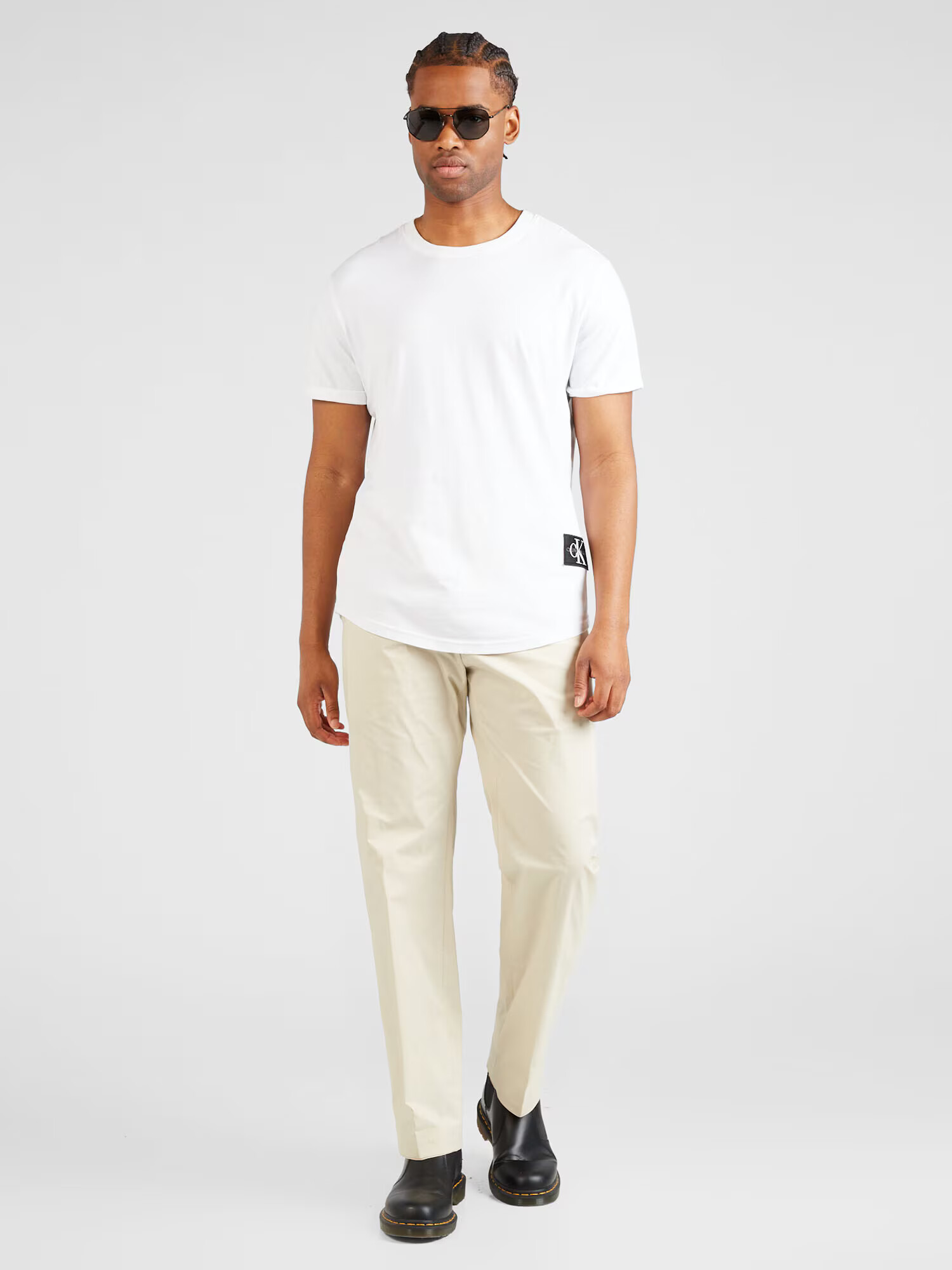 Calvin Klein Pantaloni eleganți crem - Pled.ro