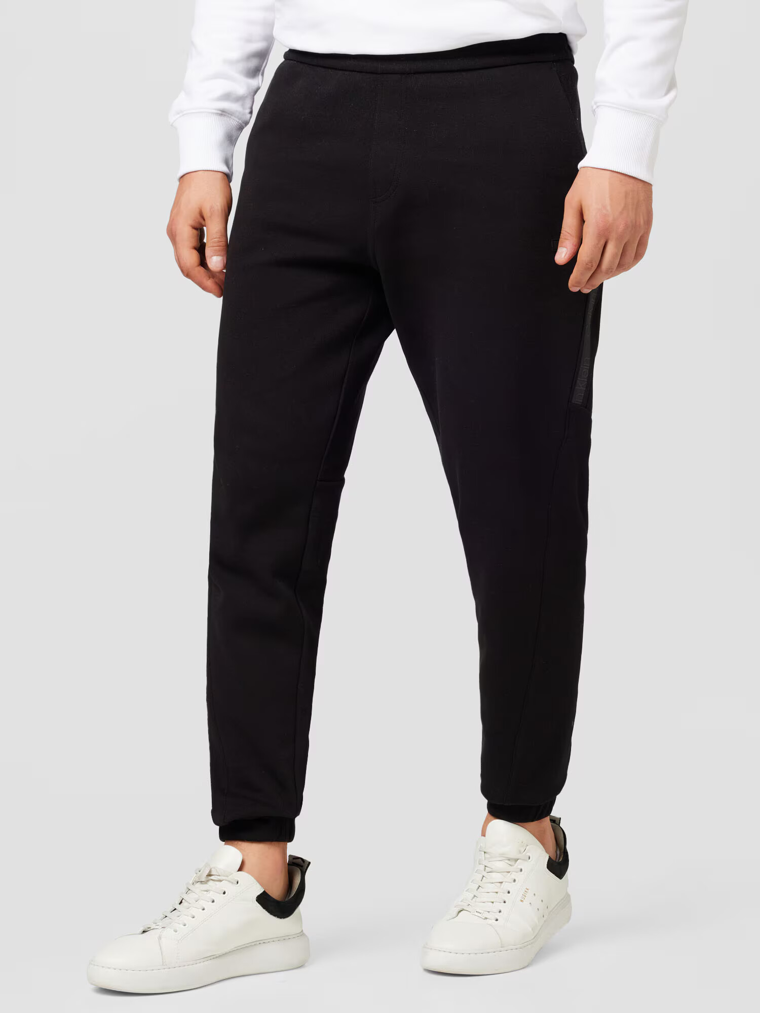 Calvin Klein Pantaloni gri închis / negru - Pled.ro