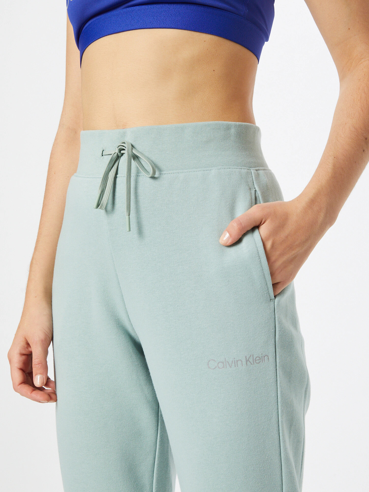 Calvin Klein Sport Pantaloni gri / verde pastel - Pled.ro