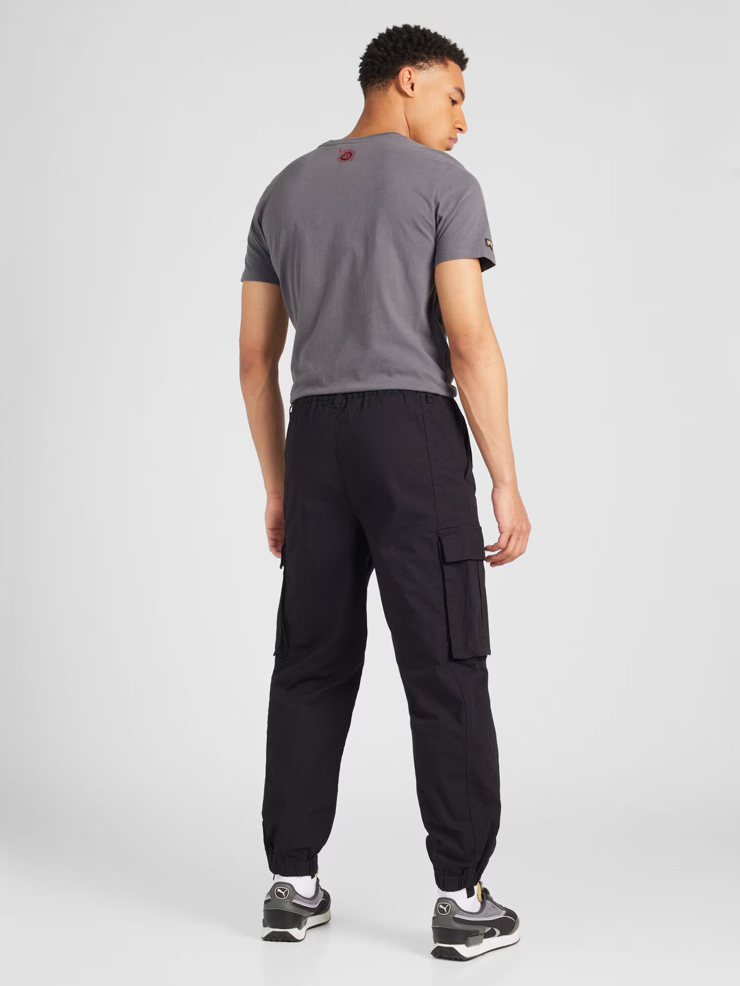 Champion Authentic Athletic Apparel Pantaloni cu buzunare roșu / negru / alb - Pled.ro