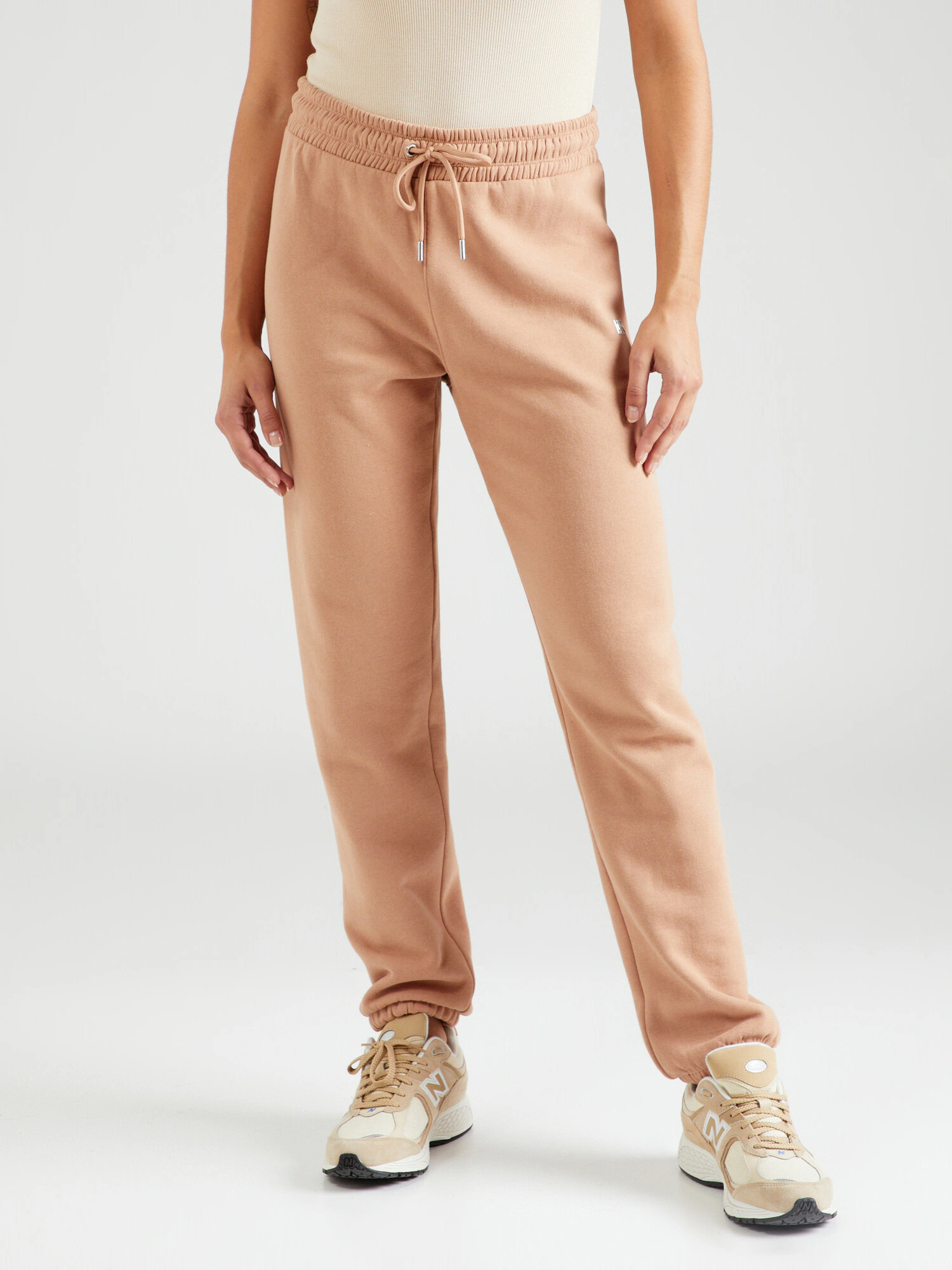 DKNY Performance Pantaloni sport maro deschis - Pled.ro