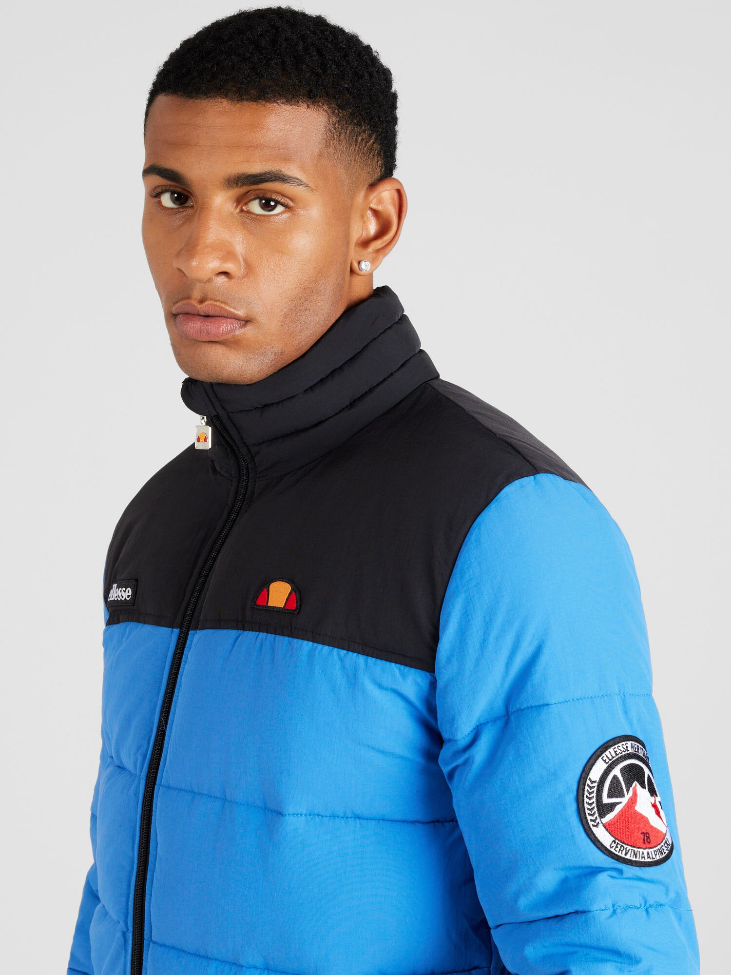 ELLESSE Geacă de primăvară-toamnă albastru deschis / portocaliu / negru / alb - Pled.ro