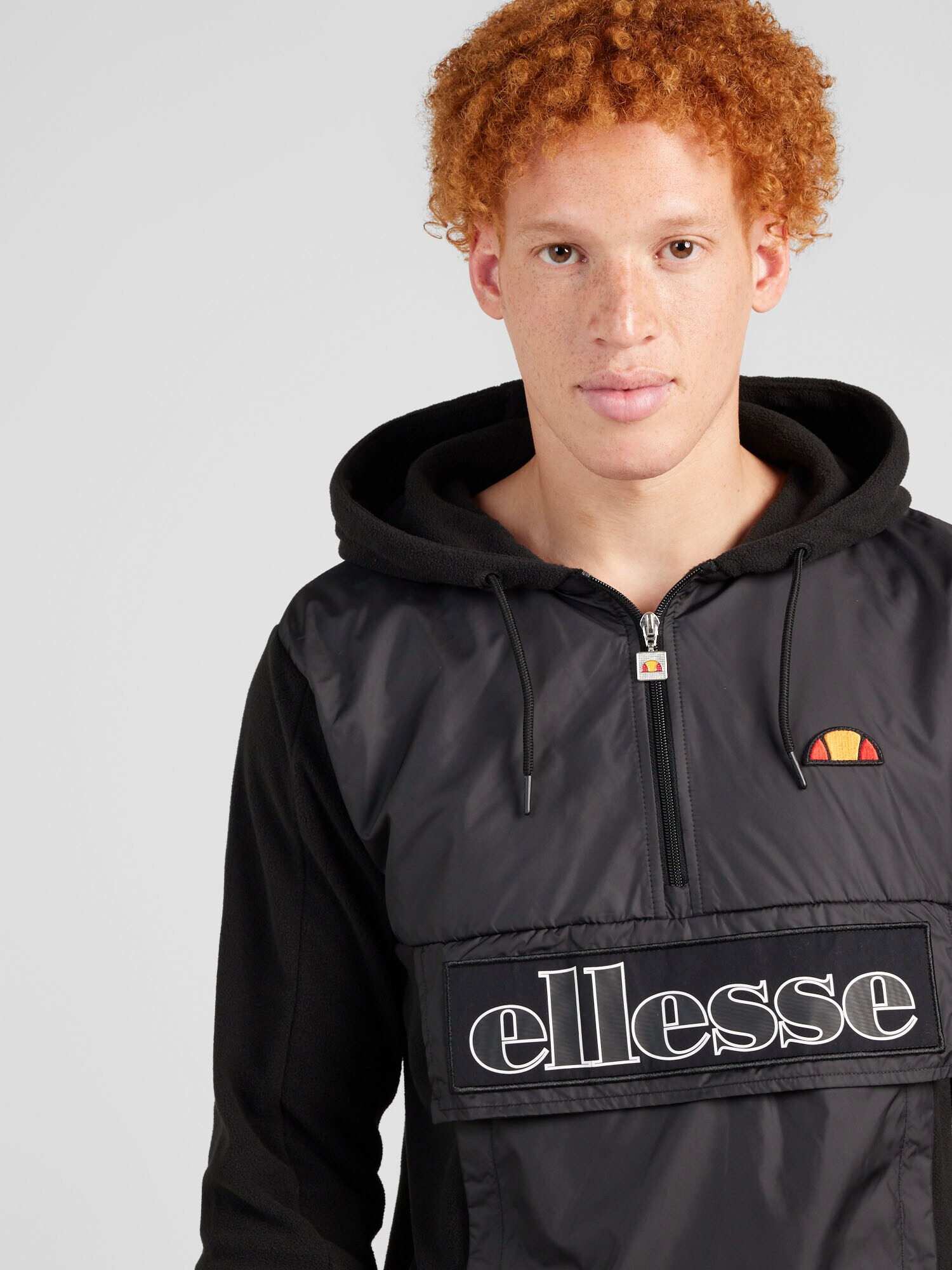 ELLESSE Geacă funcțională 'Legno' portocaliu / roșu / negru / alb - Pled.ro