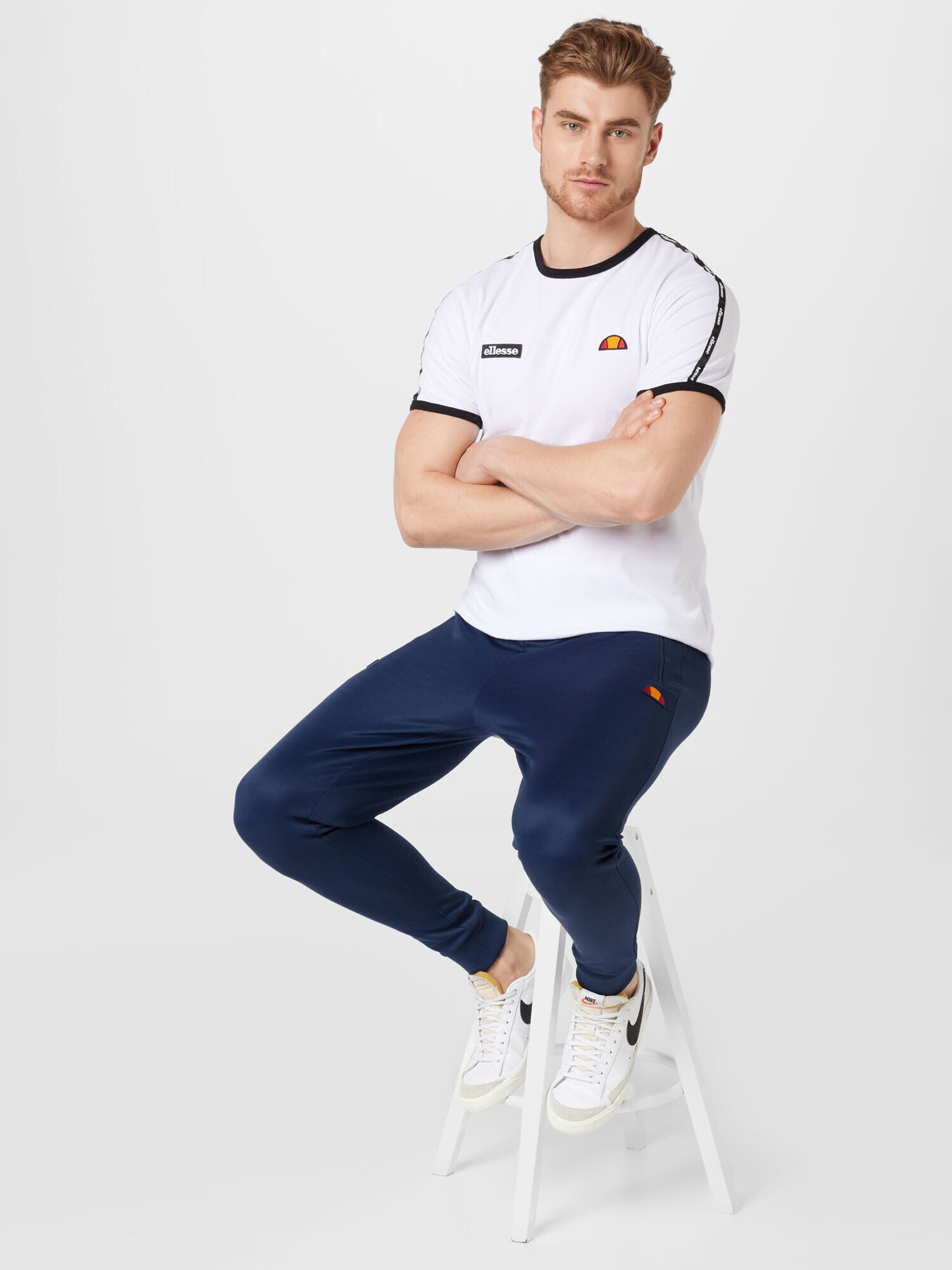 ELLESSE Pantaloni 'Bertoni' bleumarin / portocaliu / roșu / alb - Pled.ro