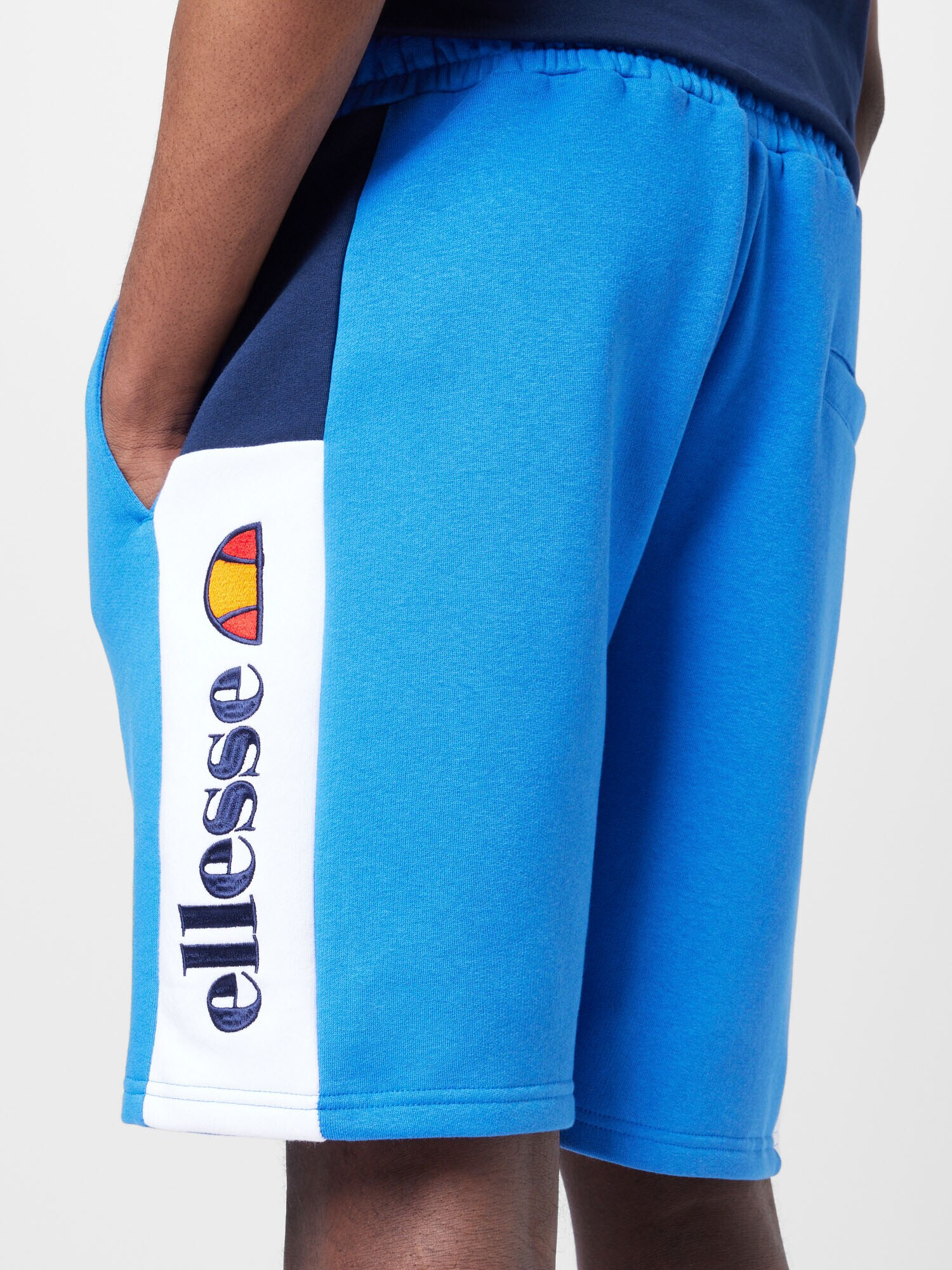 ELLESSE Pantaloni 'Bratani' albastru / bleumarin / portocaliu / alb - Pled.ro