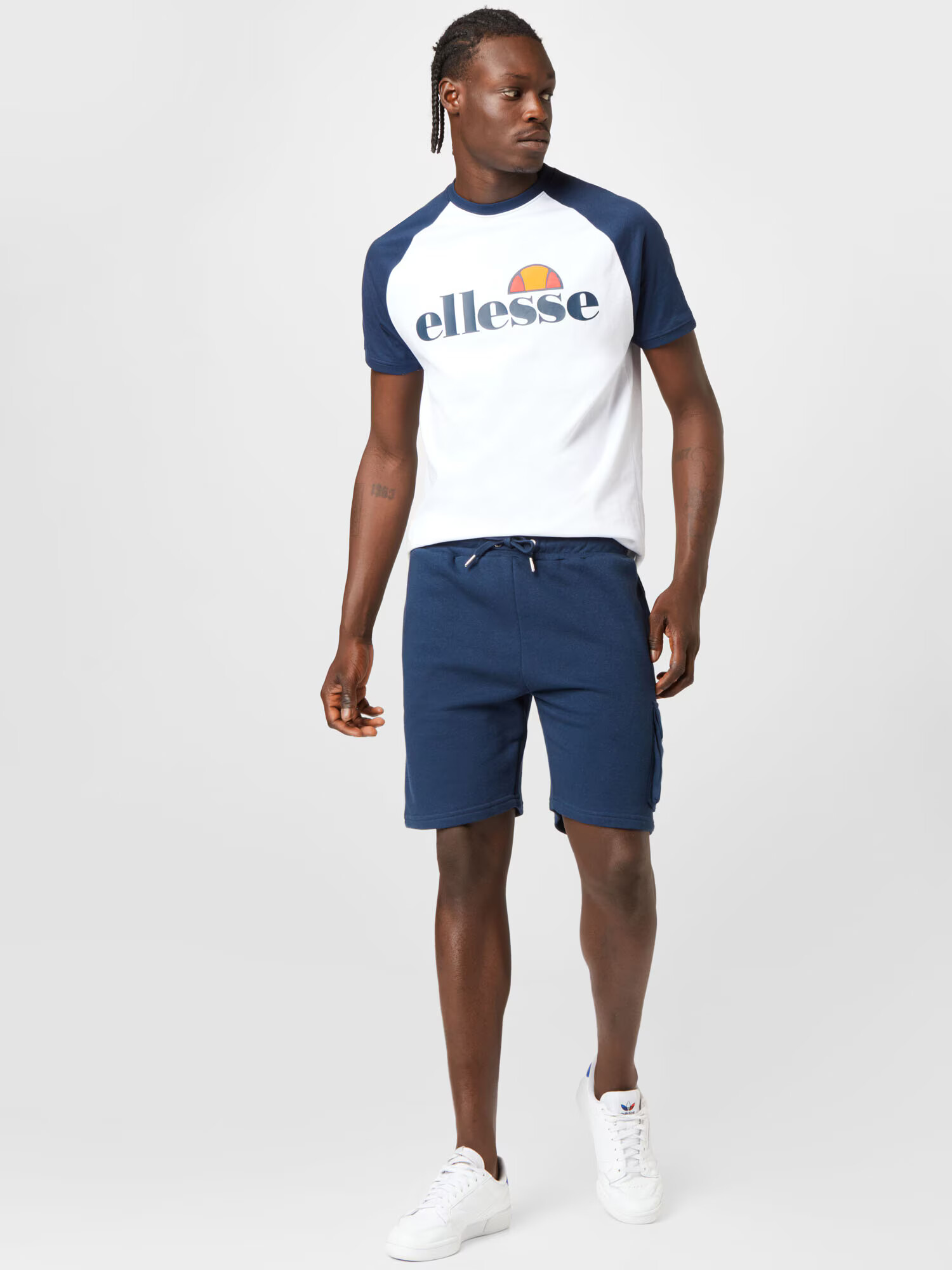 ELLESSE Pantaloni cu buzunare 'Sica' bleumarin / alb - Pled.ro