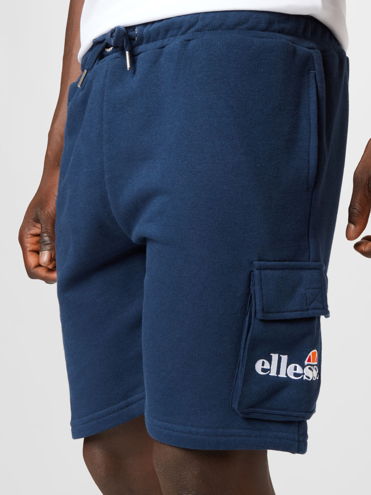 ELLESSE Pantaloni cu buzunare 'Sica' bleumarin / alb - Pled.ro