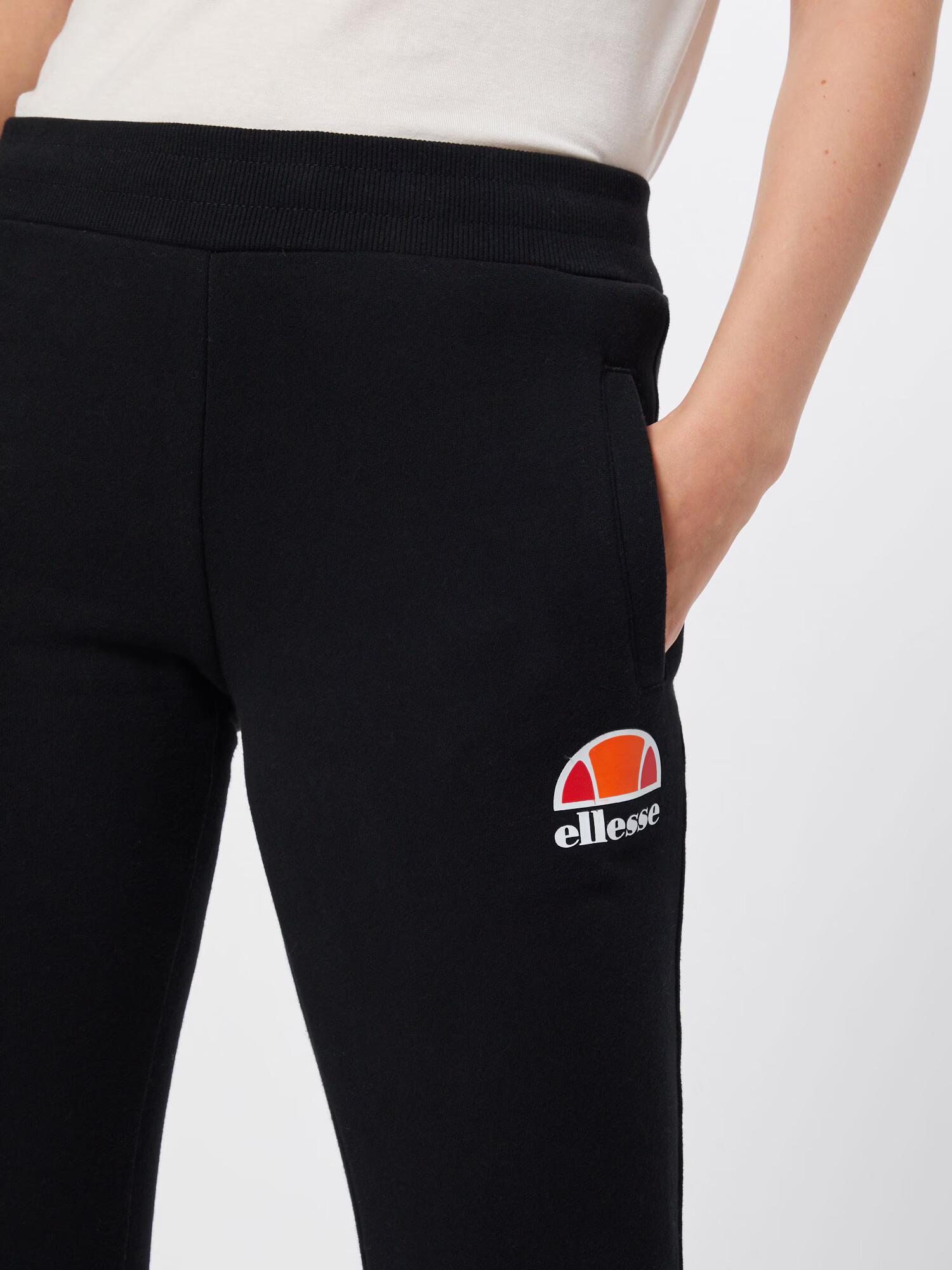 ELLESSE Pantaloni 'Queenstown' portocaliu închis / roșu / negru / alb - Pled.ro