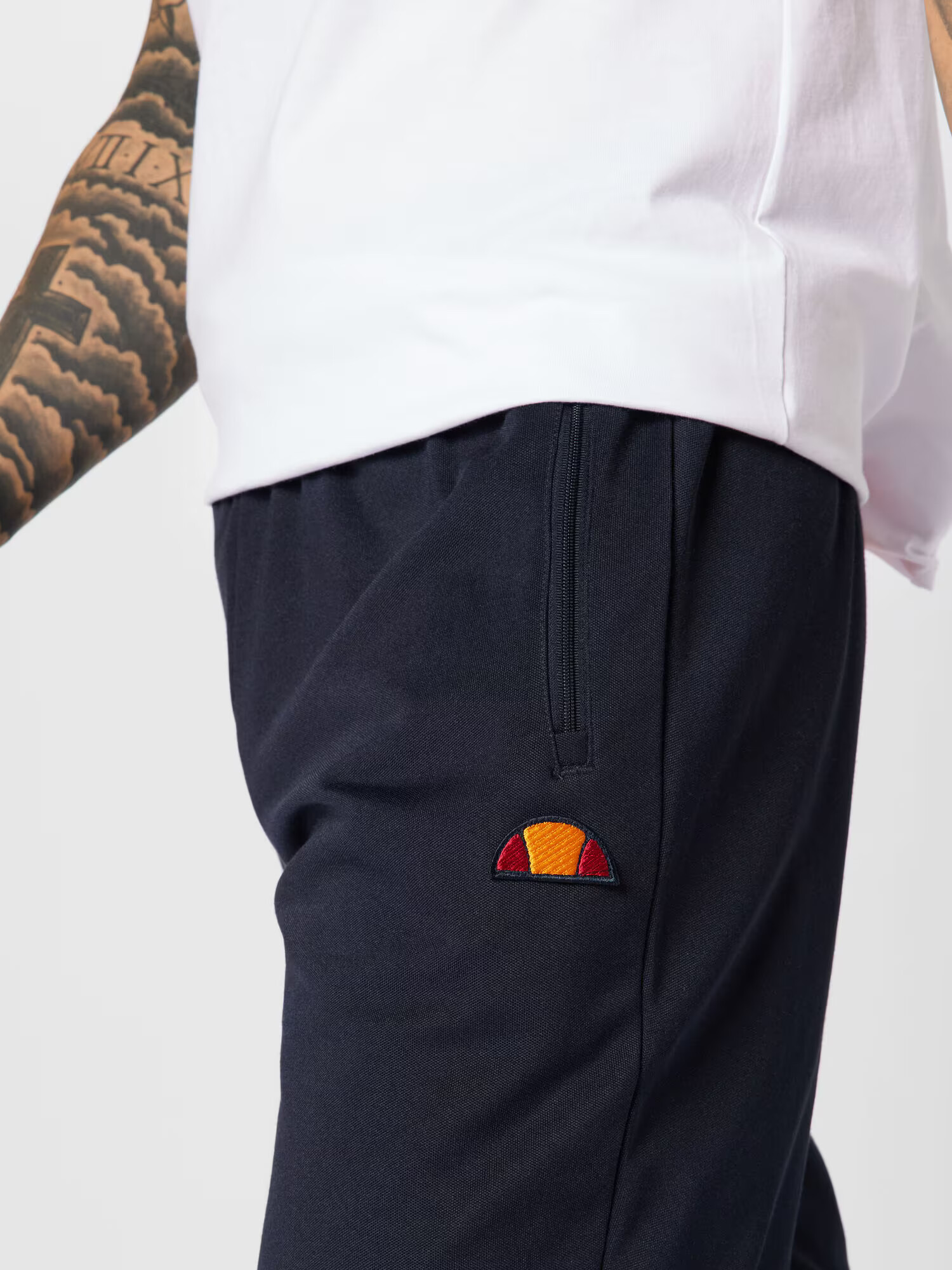 ELLESSE Pantaloni sport 'BERTONI' bleumarin / portocaliu / roșu / alb - Pled.ro