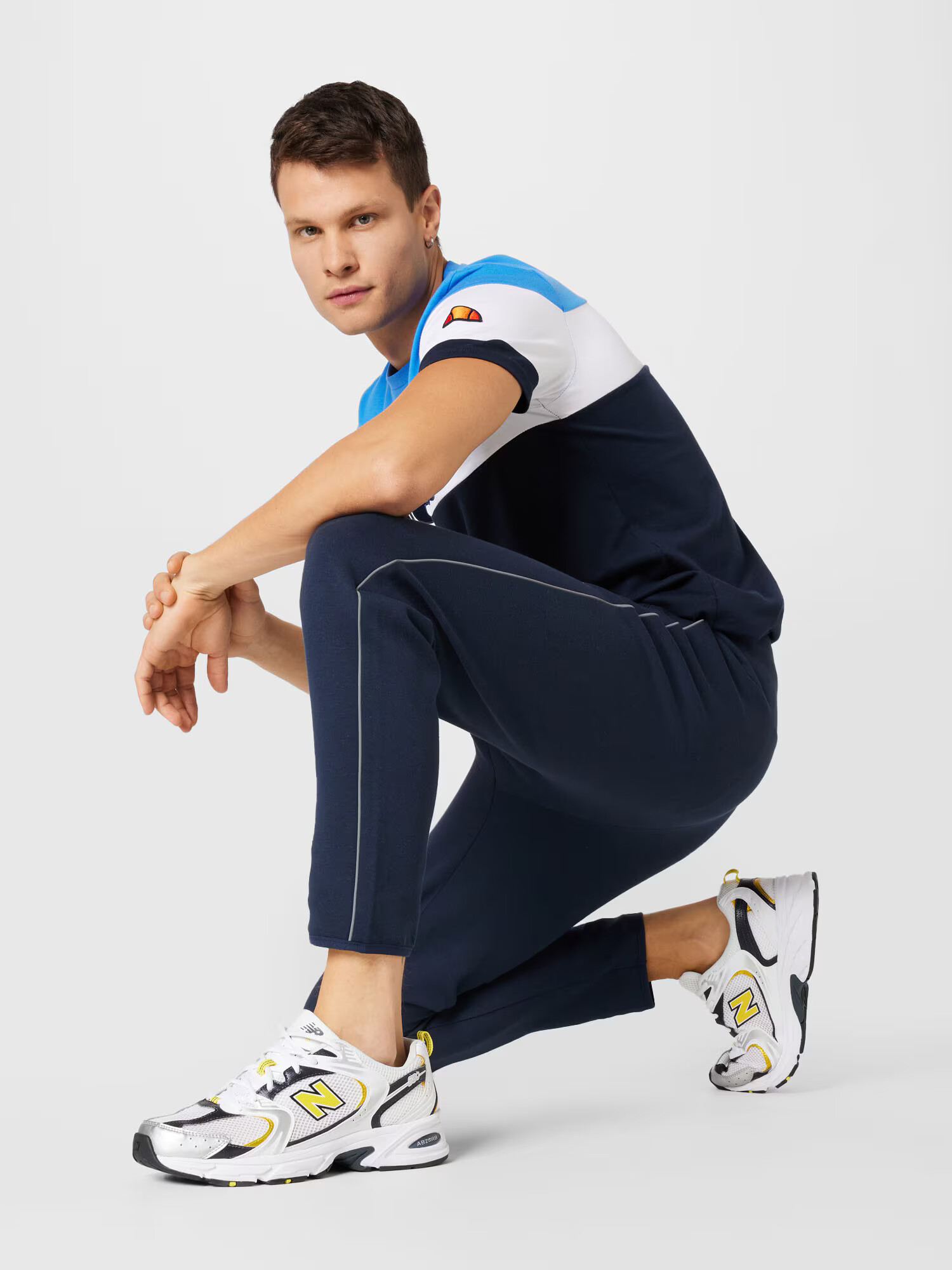 ELLESSE Pantaloni sport 'Diruta' bleumarin / portocaliu / alb - Pled.ro