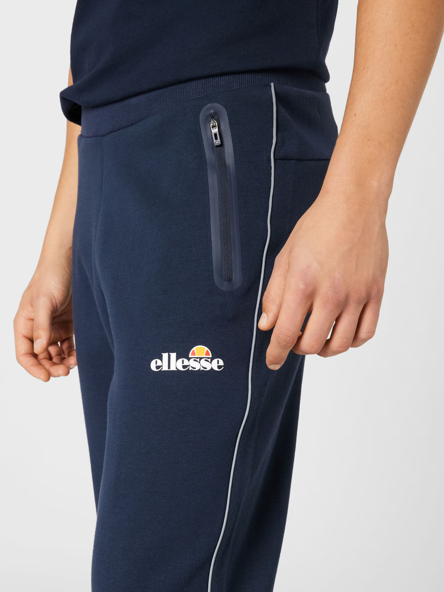 ELLESSE Pantaloni sport 'Diruta' bleumarin / portocaliu / alb - Pled.ro