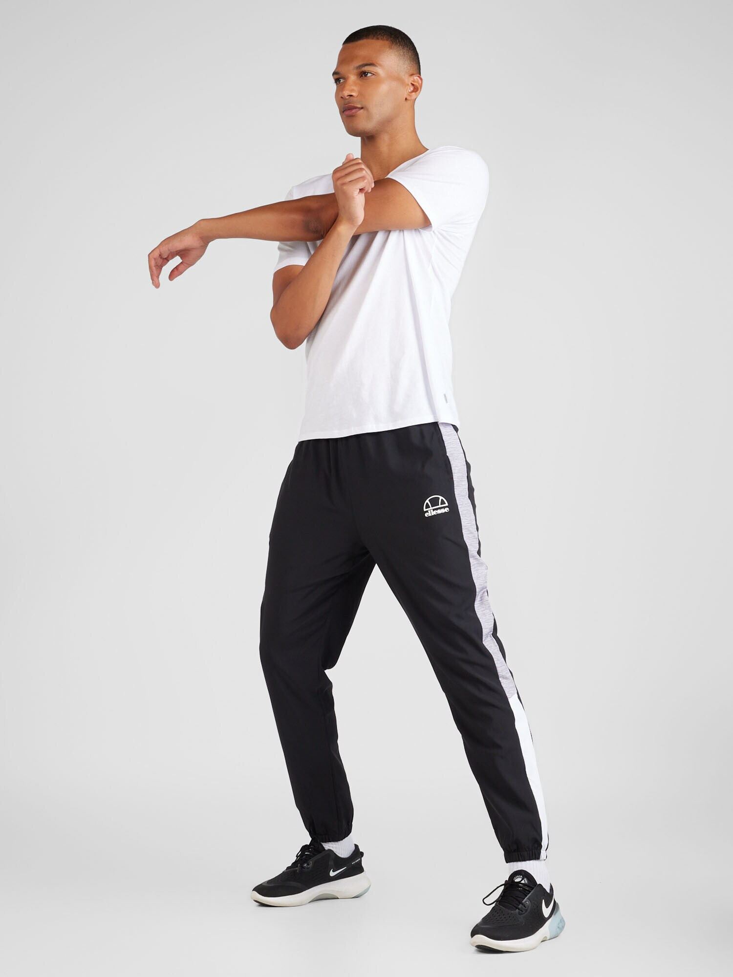 ELLESSE Pantaloni sport 'Esecuzione' gri amestecat / negru / alb - Pled.ro