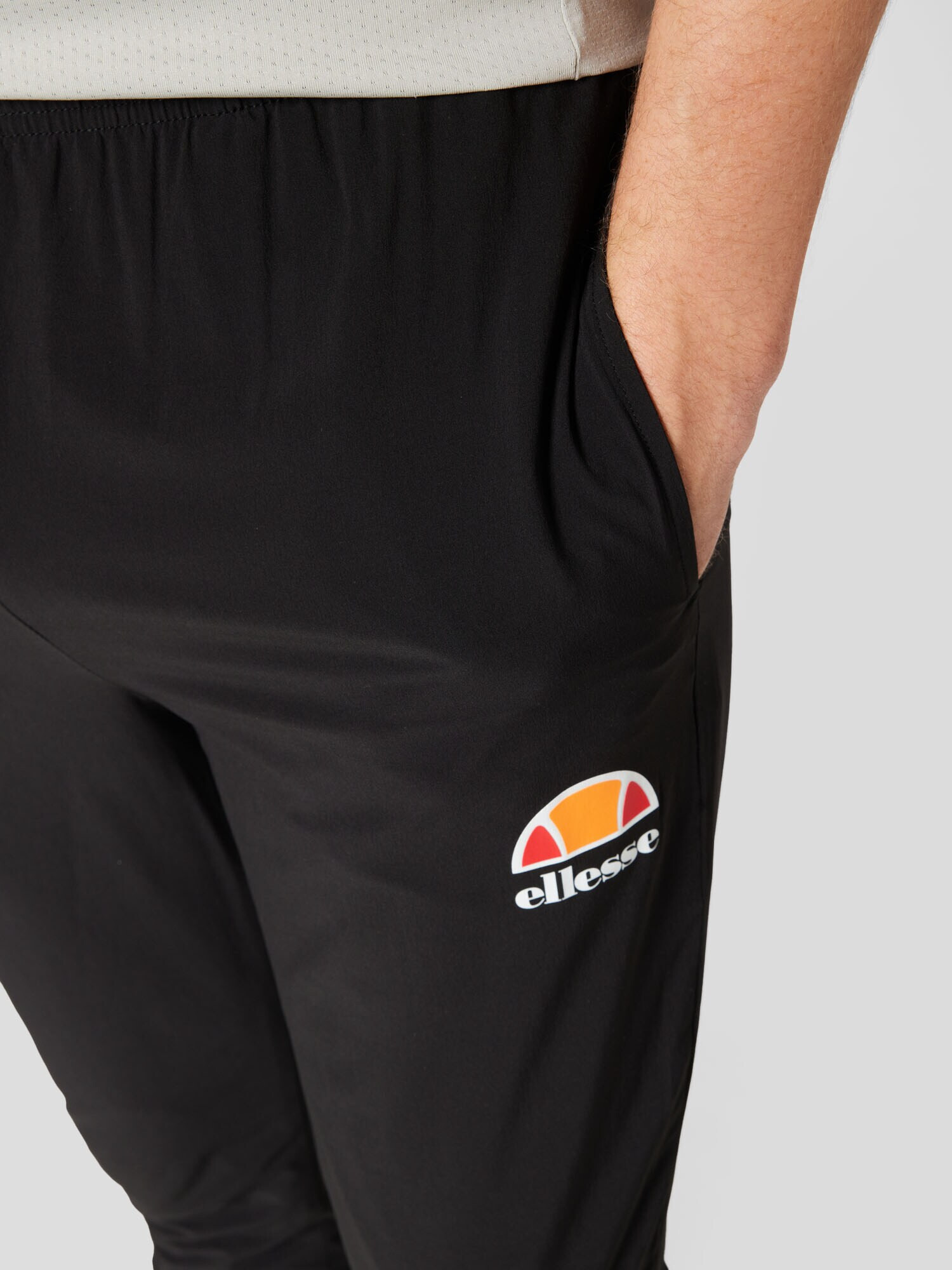 ELLESSE Pantaloni sport 'Ezio' portocaliu / roșu / negru / alb - Pled.ro