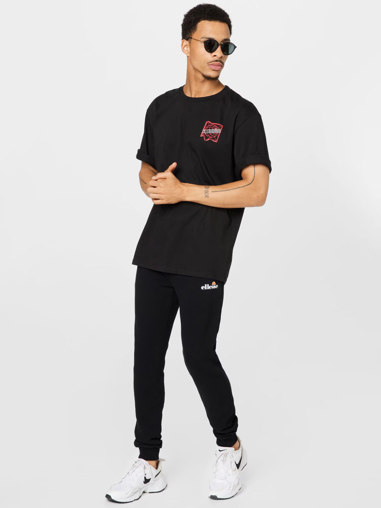 ELLESSE Pantaloni 'Granite' portocaliu / roșu / negru / alb - Pled.ro