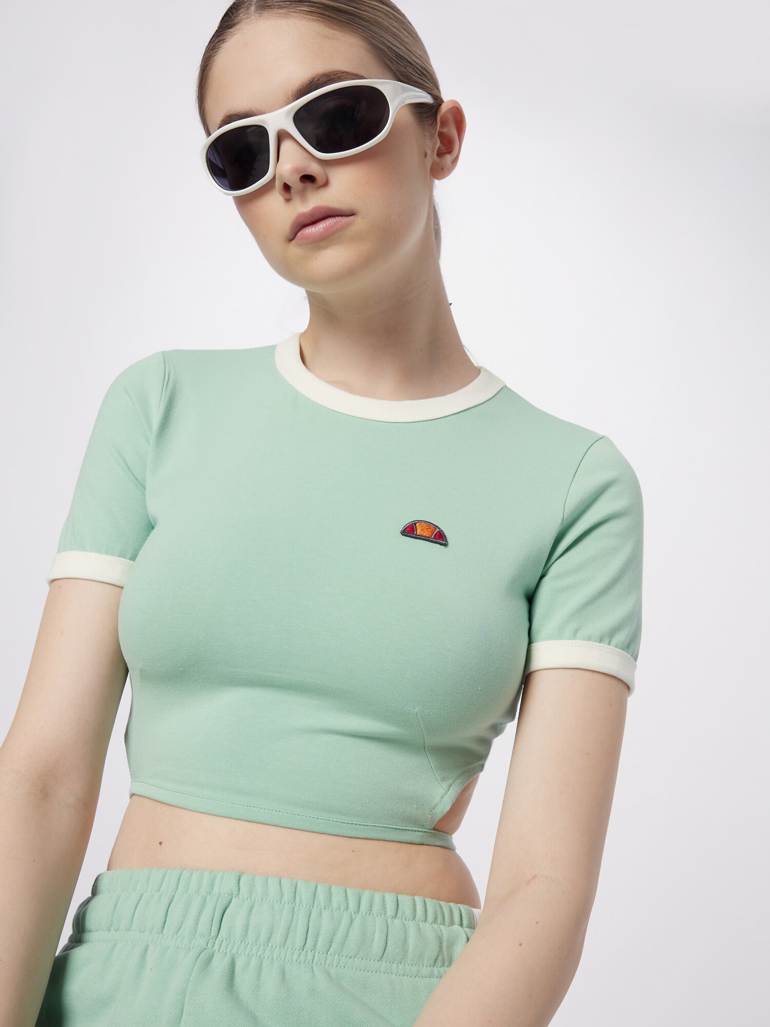 ELLESSE Tricou 'Chee' crem / albastru închis / verde mentă / portocaliu - Pled.ro