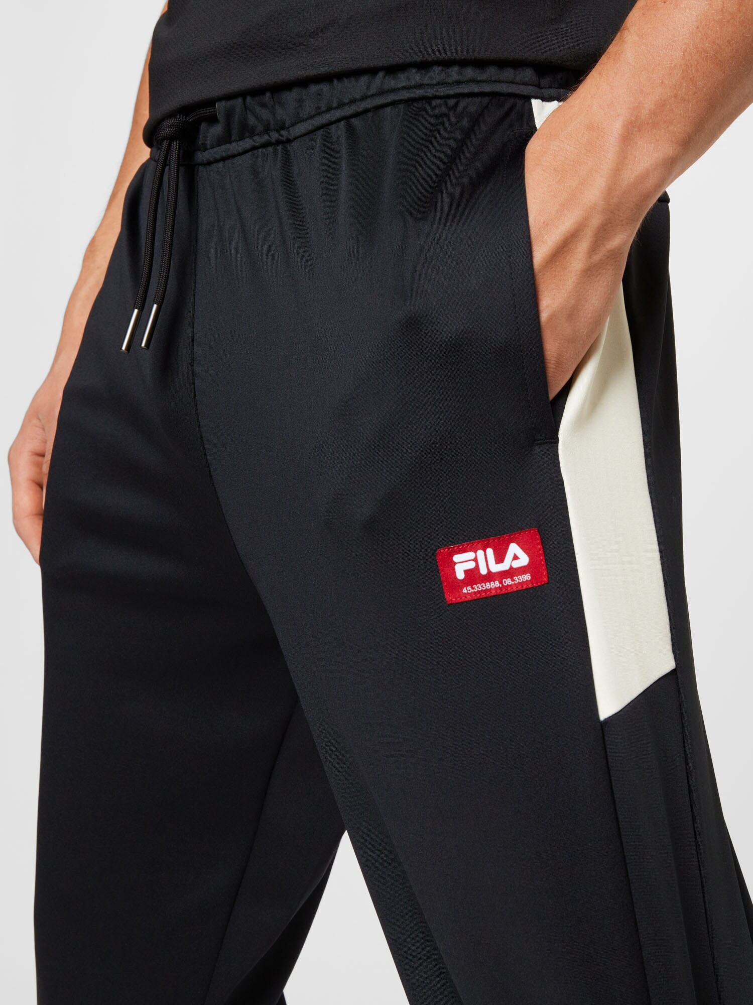 FILA Pantaloni 'Traun' roșu / negru / alb - Pled.ro