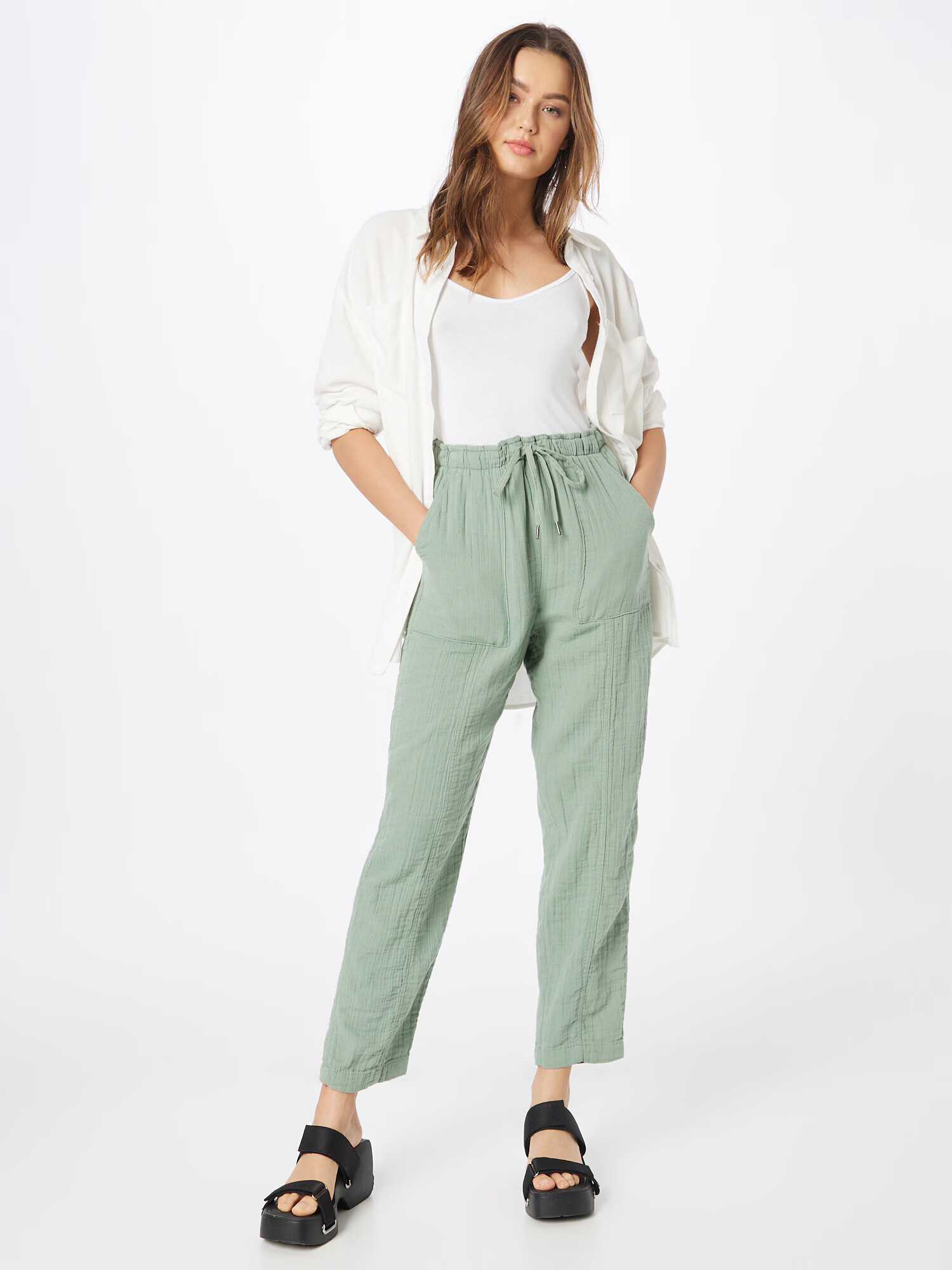 GAP Pantaloni verde pastel - Pled.ro