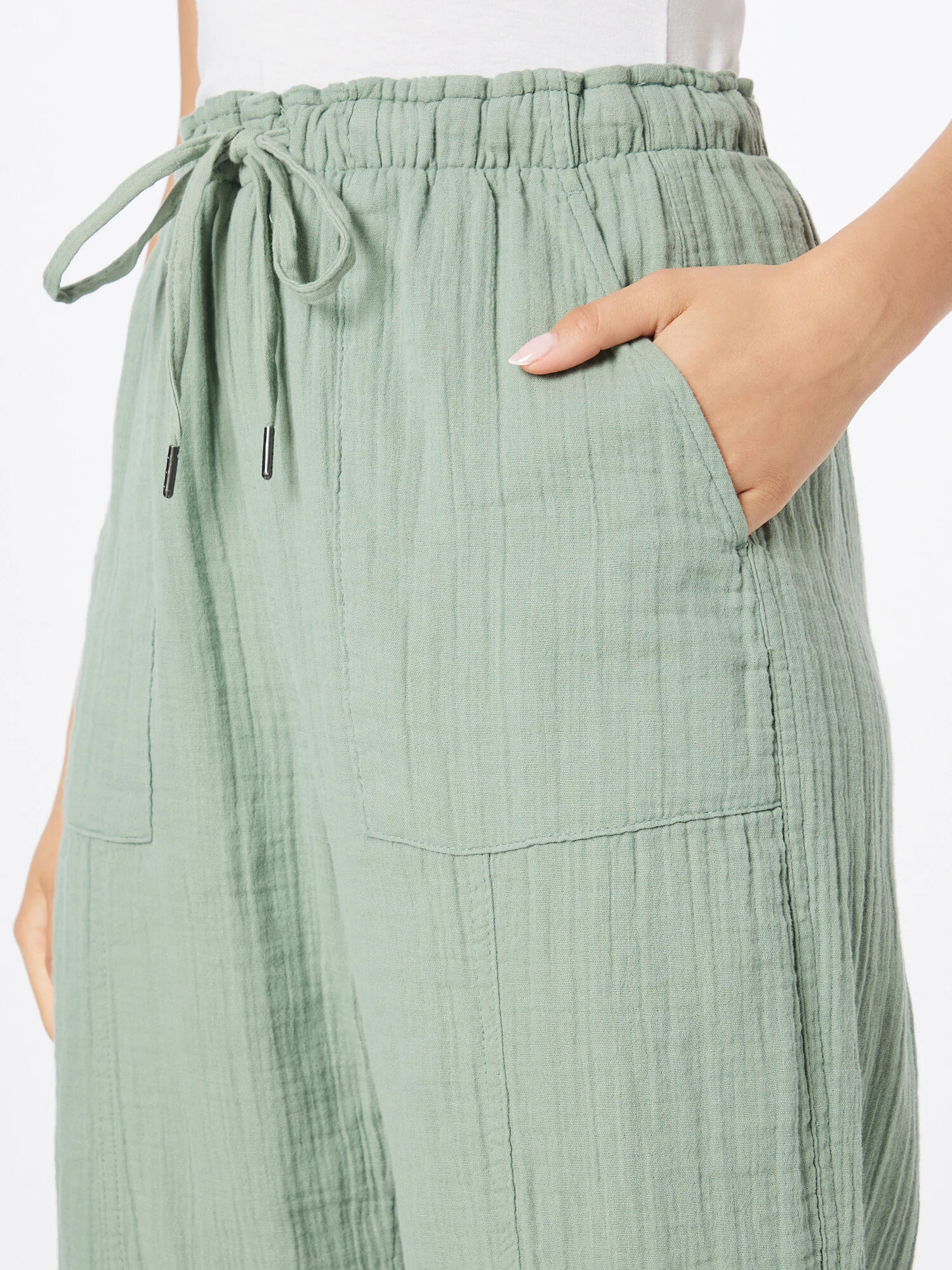 GAP Pantaloni verde pastel - Pled.ro