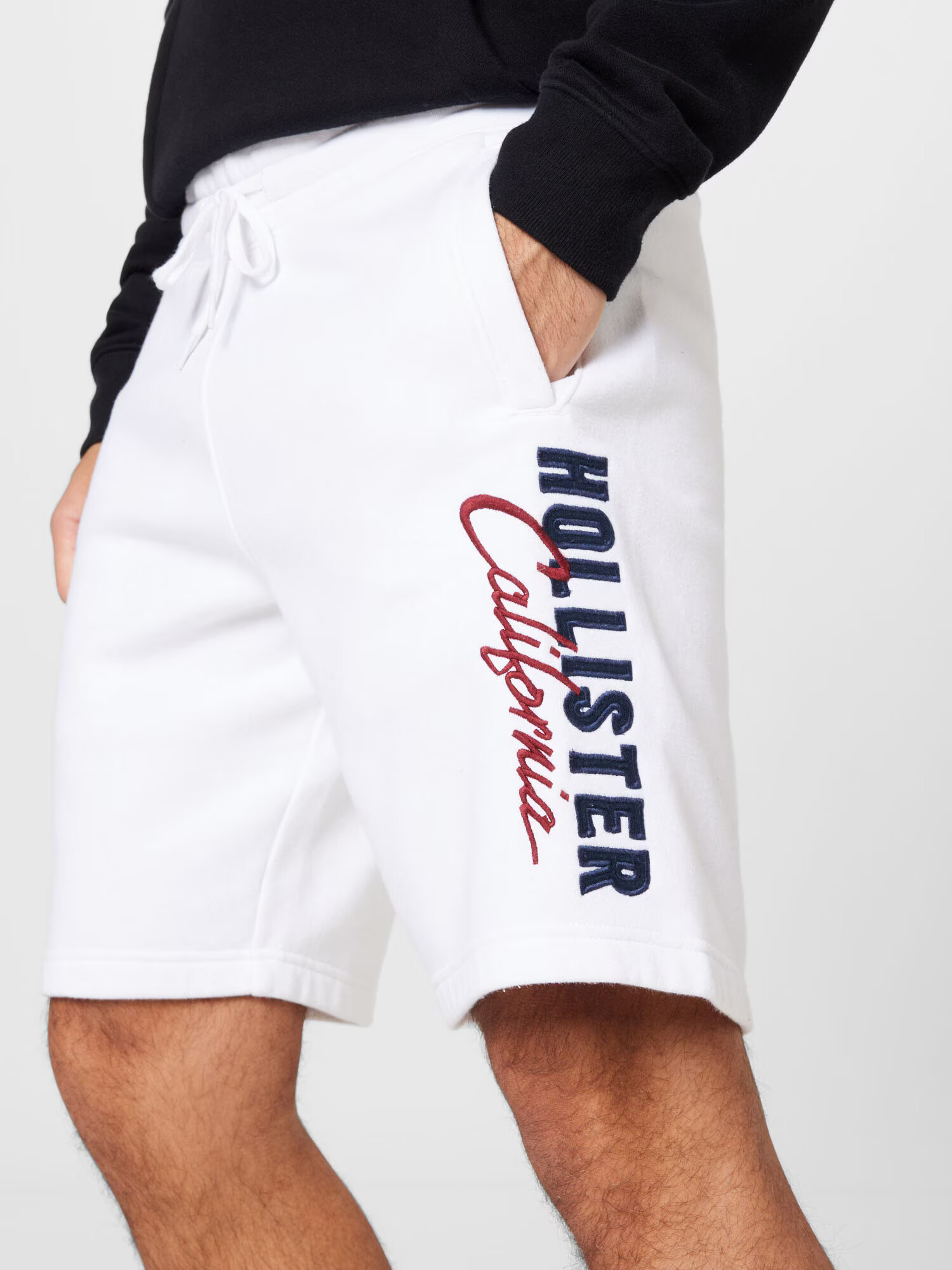 HOLLISTER Pantaloni albastru închis / roșu cireș / alb - Pled.ro