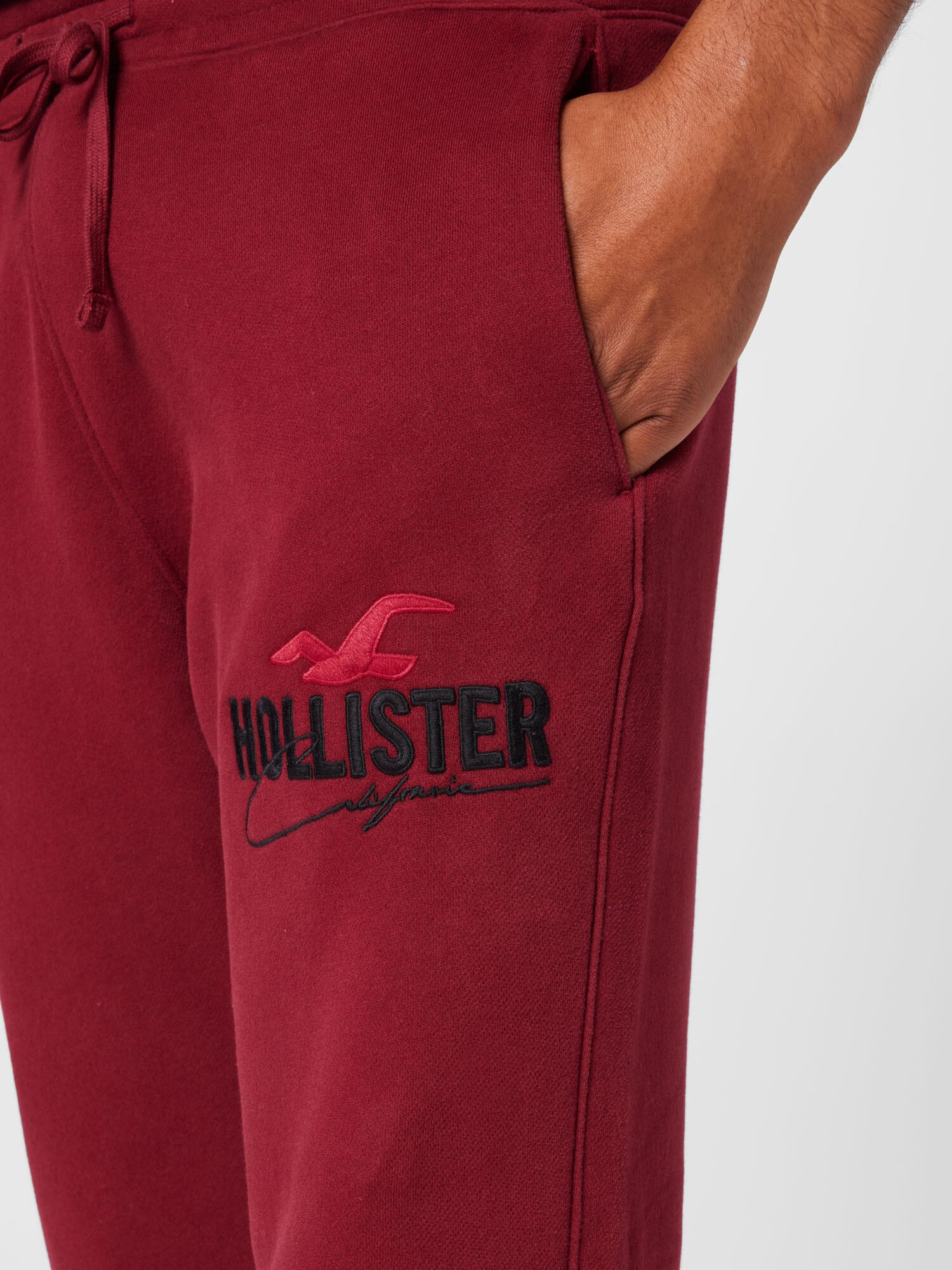 HOLLISTER Pantaloni roșu / negru - Pled.ro