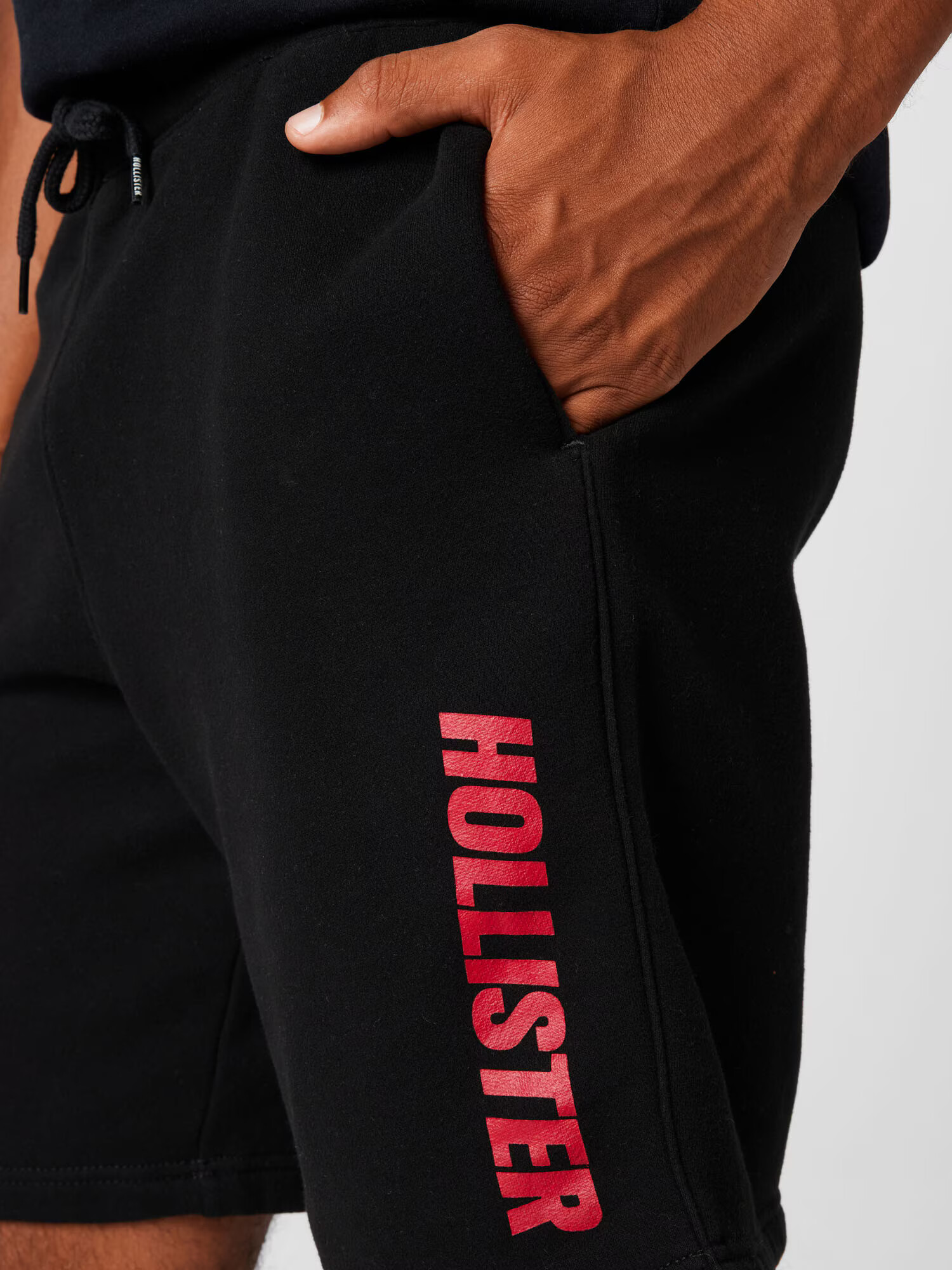 HOLLISTER Pantaloni roșu / negru - Pled.ro