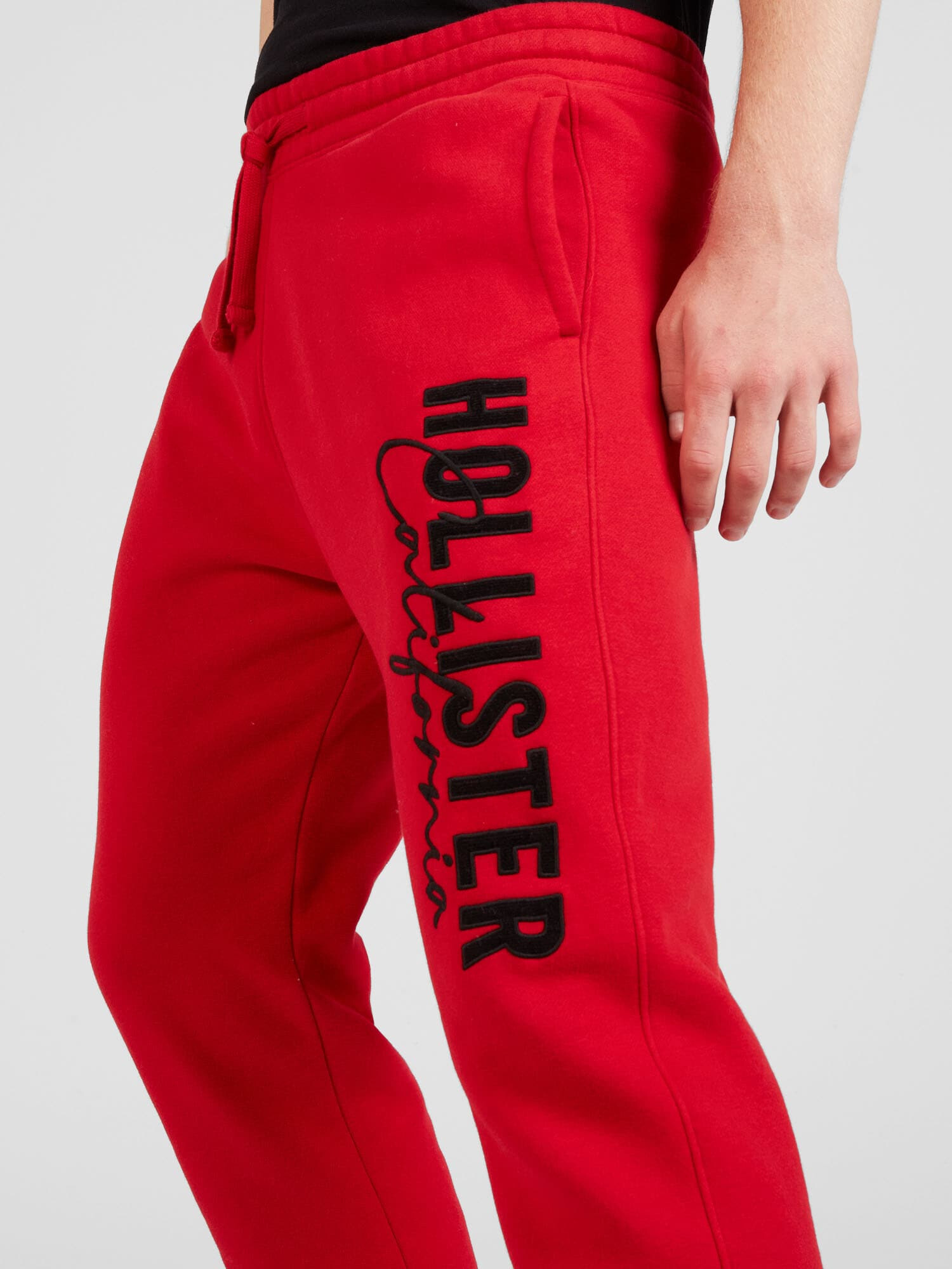 HOLLISTER Pantaloni roșu / negru - Pled.ro